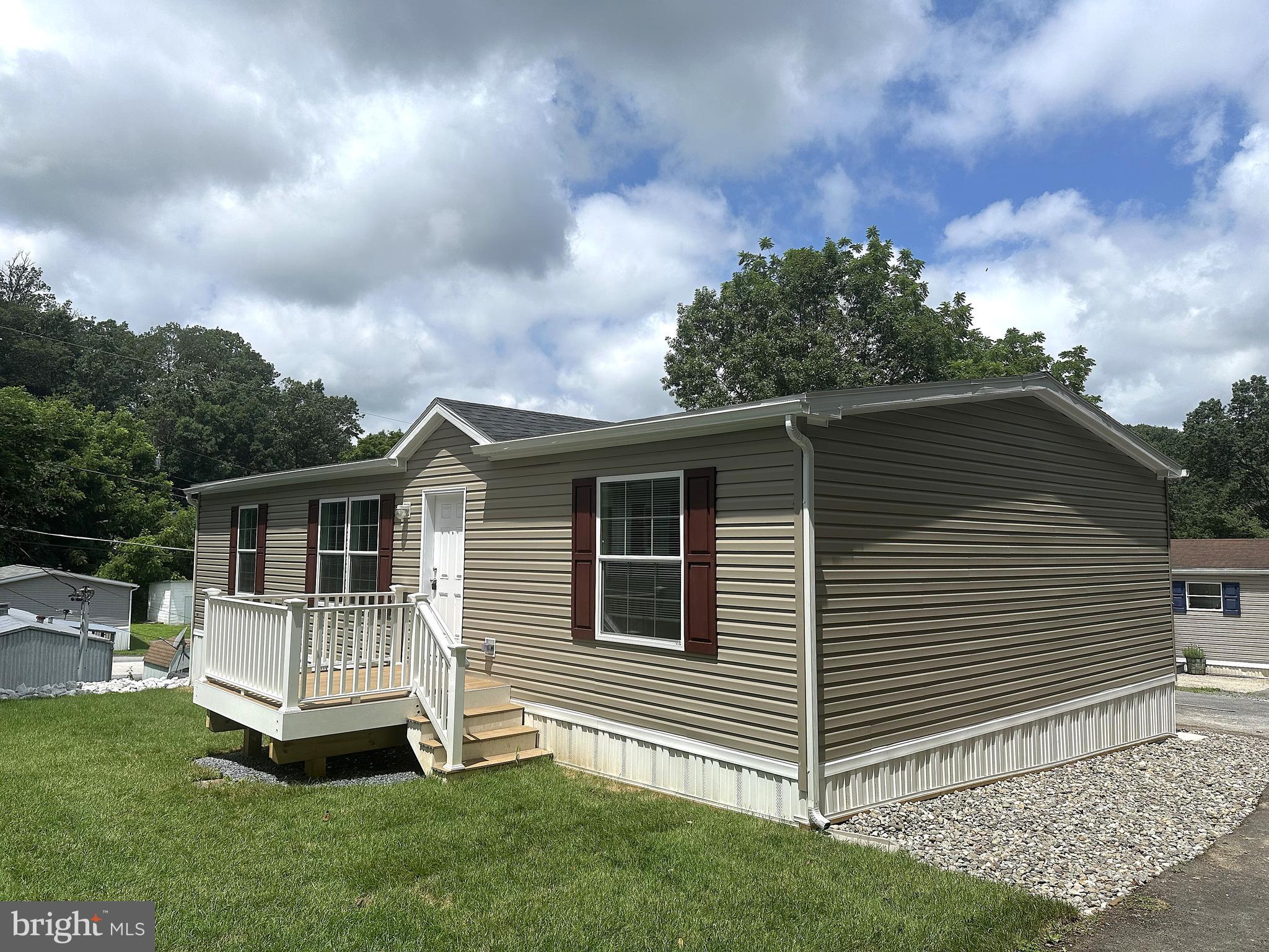Brand New and Beautiful! Built in 2025 with Over 1200 Square Feet of Living Space in Rockbrook Village Mobile Home Park. Inside Features an Open Floor Plan with a Big Kitchen, Plenty of Cabinets and Counter Space, New Stainless Steel Appliances, a Large Living Room, Big Primary Bedroom with Private Bathroom and Walkin Closet. Other Inside Features are Recessed Lights Throughout, Six Panel Doors and Separate Laundry Room with New Washer and Dryer. All Bedrooms have Large Walkin Closets. Outside is a Custom Sundeck, Nice Front Yard and Paved Driveway. The Monthly Lot Fee Includes Water, Sewer, Trash and Snow Removal. Contact me for Financing Information and to Schedule an Appointment to see.