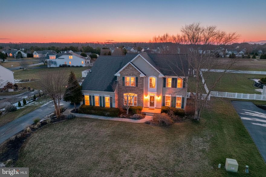 Come check out this stately home in  the sought after community of Covington Chase  with its  low HOA fee  and large lots .  This 4 bedroom, 3.5 bath home features a great room with stone fireplace and lots of  natural light from  the large windows .  The great room  flows into the spacious chef's  kitchen with room for dining and stainless steel appliances, a middle island with seating and granite countertops.  Off from the kitchen is a  formal dining room,  and off the foyer  is  a  large office,  and formal living room.   The office and  living room show off  custom trim work and crown molding.  Upstairs is your huge primary suite with vaulted ceilings,  2 closets,  and a huge soaking tub & separate shower.  Down the hall are 3 additional roomy  bedrooms.   There is also a  basement that offers endless possibilities for expansion, and already has a full bath and a finished flex room for whatever you fancy.  Loads of unfinished space is still available for storage! You will enjoy the huge fenced rear yard with mature  flowering trees  for shade and privacy while sitting on your enclosed rear porch or open deck. The front yard has irrigation with its own well.  The Nature Reserve is at the end of the road with a small boat ramp for fishing/crabbing.   While being just outside of beach traffic it's an easy commute, just minutes to all the beaches, stores, restaurants, outlets,  Rookery Golf Course, and Cape Henlopen State Park!!!  This one will be getting a lot of attention.  Don't miss out.  Call for your private tour now!