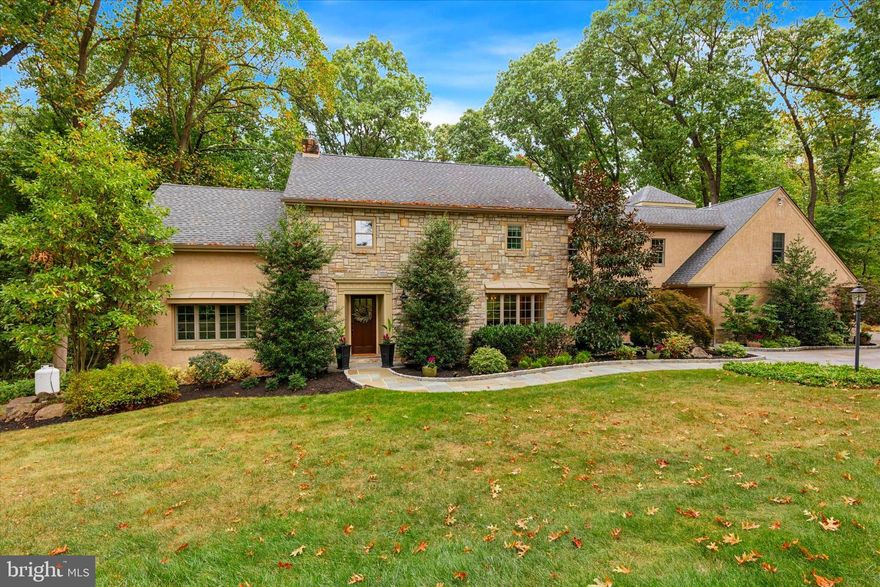 Welcome to 715 North Valley Forge Road, a stunningly updated, move-in ready center hall colonial home located in the highly desirable Shand Tract neighborhood.  This home is elegant and spacious, perfectly reflecting the charm of the Main Line area.  Surrounded by lush greenery, the house sits on a sizable lot, offering privacy and a serene environment. The architecture blends classic stonework with modern updates, reflecting the historical charm of the area while providing modern conveniences. The property includes 4 Bedrooms, 3.1 Baths, large living spaces, and an expansive kitchen, ideal for both family living and entertaining. The kitchen has high-end stainless steel appliances, large island, honed granite countertops and tile floors.  This eat-in kitchen also has a rustic wood beam that connects a large breakfast area with a gorgeous stone double-sided gas fireplace. The powder room is conveniently tucked near the breakfast room and center foyer. The expansive Family Room, ideal for gatherings, is highlighted by a stone fireplace and vaulted ceiling that opens to the second level balcony.  The first floor also has a den right off the kitchen, which could be used for a formal dining room with access to the backyard patio/pool area.  The first floor continues to an elegant step down living room with a large marble gas fireplace.  Access to the three-car garage is adjacent to the living room with a closet and extra storage space.  The basement features a built-in wine rack, additional storage, and a large finished area with a walkout to the lower back patio. Upstairs, the Primary Bedroom suite offers a luxurious retreat with a Juliet balcony, en-suite Bathroom, including his/her sinks, large shower stall, private toilet room, and a very large walk-in closet. Down the hall, you'll find three additional spacious Bedrooms, and two full Bathrooms, one with marble floors, a quartz vanity table and separate door to the shower space and the second is a full hall bath with quartz countertops.  The backyard offers a relaxing retreat with a beautiful pool and two different patio areas. One patio is ideal for an outdoor dinner with friends/family including a separate grilling area while overlooking the pool and the woods behind the house, allowing easy entertaining with a private setting.  The second patio hosts a hot tub with easy access from the walkout basement door on those cold winter nights.  A spacious shed sits in the backyard as well for all your gardening and landscaping tools.   This home is situated in the highly rated Tredyffrin Easttown School District, celebrated for its top-rated public schools. You'll enjoy convenient access to Trader Joe's, Whole Foods, Wegmans, the King of Prussia Mall, Route 202, the Schuylkill Expressway, and the Pennsylvania Turnpike. The Paoli-Thorndale regional rail line offers easy commuting to the city. Don’t miss this rare chance to own a gorgeous family home in one of the area's most coveted neighborhoods.