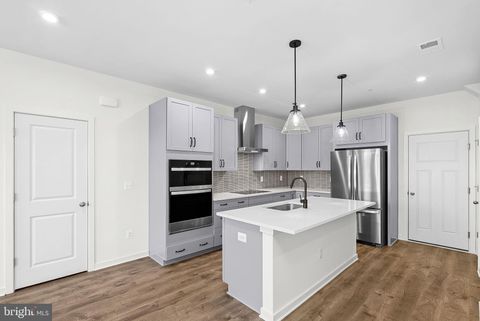 Photo of 43841 Venetian Square, ASHBURN, VA 20147 (MLS # VALO2121496)