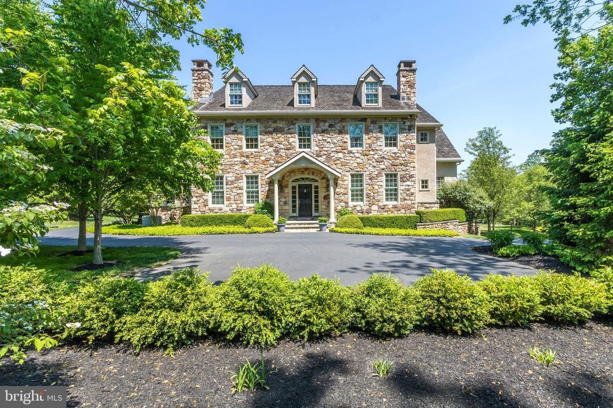 Exceptional home built by McGahan Enterprises in 2005. This must be on top of your list to see! No expense was spared in this gorgeous home which was featured in Dream Homes of Philadelphia (architect Christopher Luce). This stunning home reflects quality from top to bottom. Lush landscaping, and privacy on almost 5 Acres! Conveniently located minutes to New Hope in Solebury Township! Gracious two-story entry, featuring 9 ft, 10 ft and 22 ft ceilings ceiling, arched doorways, raised panels coffered ceilings, 3 Masonry fireplaces on the main floor, 4 Bedrooms, 5 Full Baths and 2 half baths. Gorgeous, timeless kitchen with Shaw farm sink, honed granite counters and center island, Sub Zero, 6 burner Commercial Wolf range, Custom Draper cherry cabinetry, breakfast room with views and access to sunny deck featuring remote awning. Great room featuring Wood burning stone front fireplace, 22 ft ceiling, coffered ceiling. Formal Dining room, wet bar, Living room, Kolbe windows throughout. Home office, first floor laundry, full bath, and access to three car garage. The second level features a lovely main bedroom suite with balcony and newly updated bathroom with walk in shower, facing gas fireplace. Three additional bedrooms, with a central area for library or study and back staircase. Unfinished attic space awaits many possible uses. The lower level finished just as beautifully, with natural daylight and walk out to patio with jacuzzi. A full media room with handsome built in, custom spaces. A convenient kitchen, and extraordinary 1500 bottle wine cellar, nearby a craft room, gym, and spotless mechanical room. In addition full house generator, this home is beautifully designed and beyond meticulously cared for. It is like a brand-new home. Stucco was addressed and small repairs in 2019. Natural gas! Plenty of room for a pool! This home is truly stunning, the quality and maintenance is incomparable!