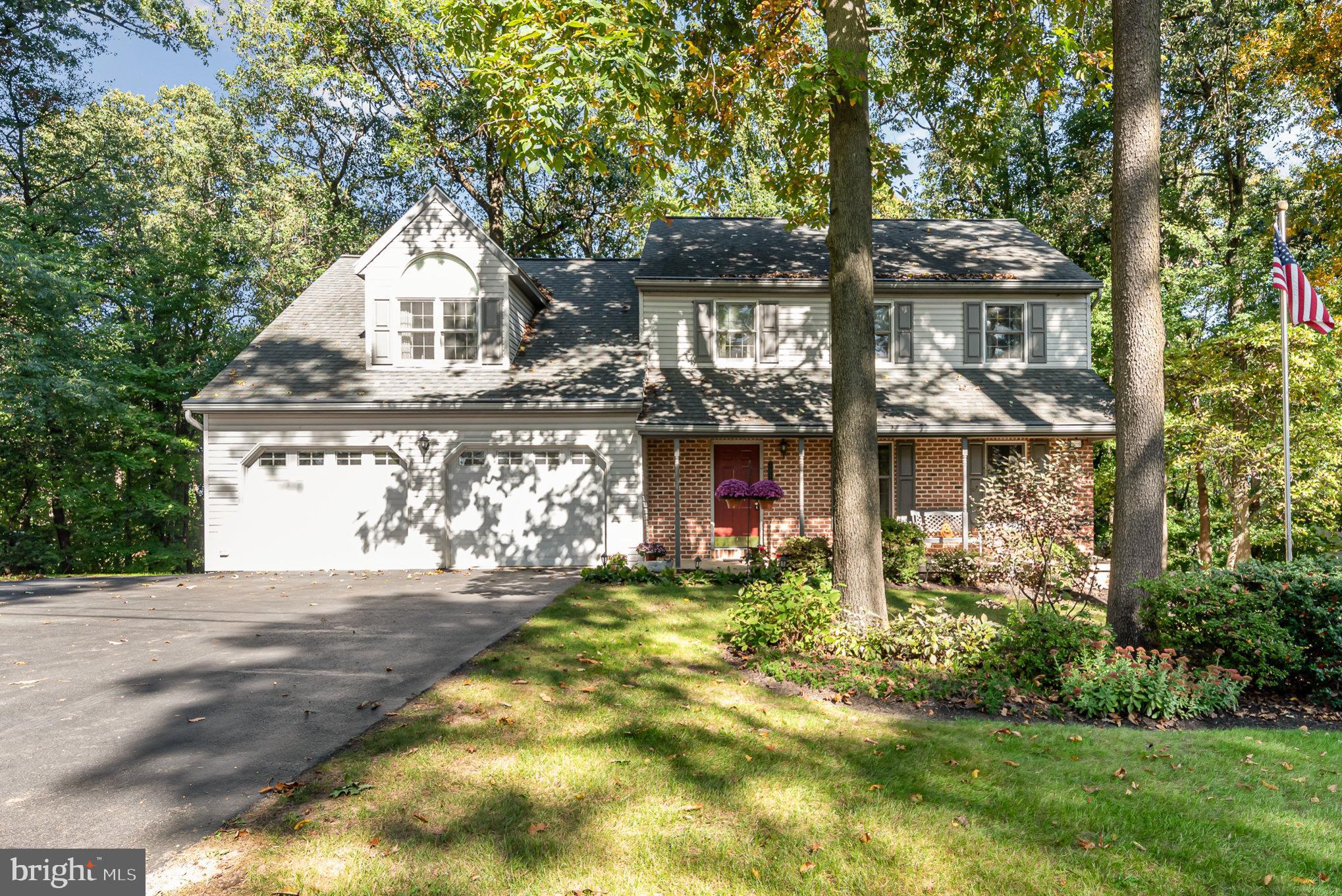 Welcome to 2075 Ridge Rd in Elizabethtown. This home was a custom build by the current owner and wow they did a great job designing this not to be a cookie cutter home. The home features 4 bedrooms and 2.5 baths over 2368 finished square feet. Tucked away in the woods you will find tranquility on this 1.16 acre property on the outskirts of Etown. The master bedroom is giant with its own reading nook, walk in closet and large master bathroom including a jacuzzi soaking tub. The other 3 bedrooms share a large bathroom that has the convenience of 2nd floor laundry included. The eat in kitchen opens up to the main family room with a cozy pellet stove as secondary heat. The patio doors of that family room lead to the private deck overlooking the back of the lot and the farmland next door. The dining room and living room off the kitchen add to the space on the main floor. And wait till you see this basement. It has its own 1 car garage door for larger toys, a massive workshop under the 2 car garage and even a pistol range in the corner. Outside the home you have a horseshoe pit with electric run to it, a play area, shed and a walking path down the back hill. Room for a lot of activities for sure. Come see this home ready for its next owners today.