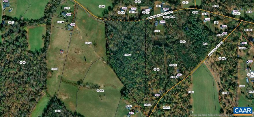 Lovely Wooded 16 acres with road frontage on Oak Park. Small stream