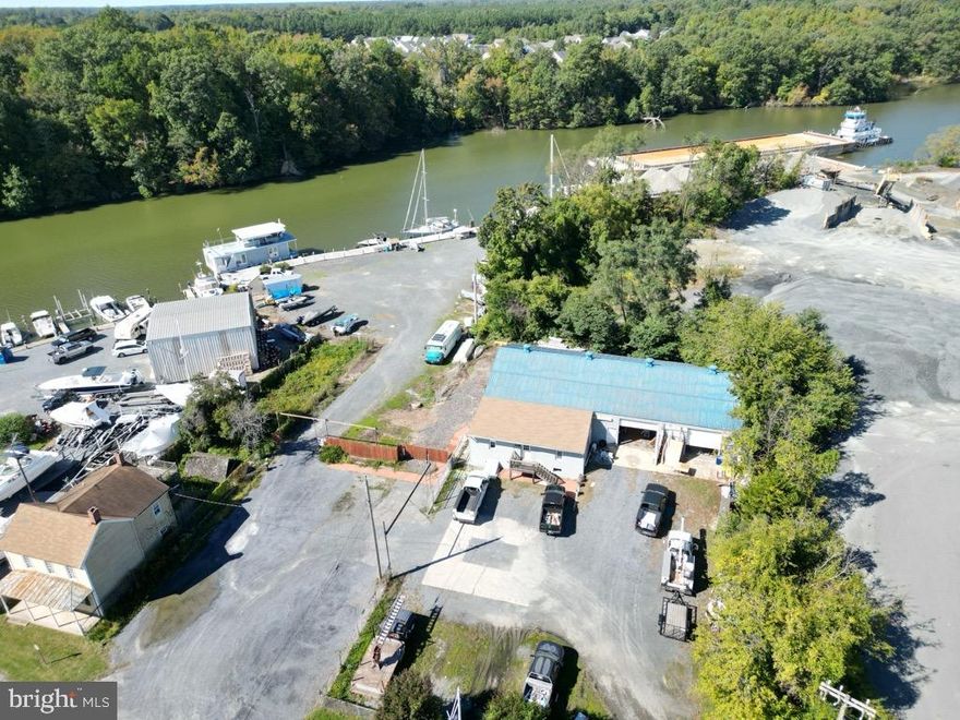 Deep Water development site with two parcels, an Industrial Grade building Docks and Bulkhead.  This site is in the Town of Easton with the ability to connect to Public Utilities such as Water and Sewer.  This entire area has several very advantageous designations including "Enterprise Zone"  "Opportunity Zone" and the rare I.D.A. Critical Areas designation.  Incredible views down the Tred Avon River can be seen from this surprisingly elevated site.  Located next to the public boat ramp, marina and gas station on Easton Point