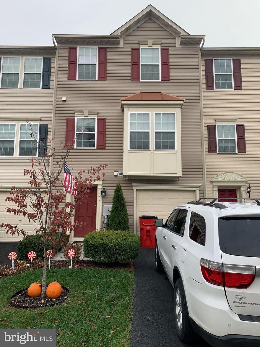Beautiful townhome in Brookfield.  Large thanks to the 12' morning  room bumpout which extends to all 3 levels making the total sq ft 2400 -- one of the largest  townhomes  in Brookfield.  Seller is a computer guy and has the home hard  wired for high speed internet..  First level :  garage, den and half bath.  Second level:  Open flow layout. Large living room, half bath,  island kitchen with  and dining area.. That opens to a morning room or family room (surround sound in that room and it opens to a huge outside deck.) Third level: 3 bedrooms, 2 full baths (large master with private bath).   Plus it backs up to an open area.  This is a lot of home for the price. in a desirable location.  Brookfield has a park  for the residents with access to the Potomac River.  It is a beautiful area.