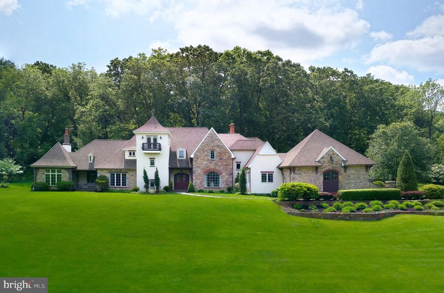 Privately situated on 5 lush acres on highly desirable Washington Ln, this stunning French Country estate offers an incomparable living experience highlighted by exquisite architectural details, refined finishes & a gracious floorplan.
