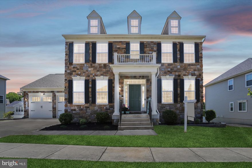 Welcome to 9603 Wickstead Court in Perry Hall. Recently built in 2016, this gently lived-in stone front Colonial presents 4200+ sq ft finished living space and is situated on a quiet street in Bishops Meadow.  Conveniently located near ample shopping, dining and recreational options this location is sure to please the most discerning of buyers. Angel Park, as well the new Perry Hall Library, are both within walking distance from your front door step. This beautifully appointed and “like-new” home offers Four spacious Bedrooms, Four and a Half Bathrooms, a Fully Finished Walk-Out Level Basement and maintenance free Trex Deck off the rear of the home. The upgraded gleaming Hardwood Floors welcome you at the foyer entrance and continue through most of the main level. The Grand Kitchen boasts a huge center island with elegant granite counters, backsplash, luxurious custom cabinetry with crown molding, a four-burner electric cooktop (1 year old) and stainless steel appliances - the perfect space for entertaining your family and guests. The sun-drenched Sunroom bump-out is adjacent to the Kitchen, where you can enjoy your indoor plant arrangements, additional living or dining space. The tremendous Family Room features a wall of windows with a stone electric fireplace and custom stone surround.  Additionally found on the Main Level of the home are the separate formal Living and Dining Rooms along with a bonus Office. The Upper Level of the home offers an over-sized Owner's Suite with a Large Walk-in Closet, a lavish Primary Bathroom with Dual Vanity, a huge walk-in shower with clear frameless door and separate Soaking tub. Another great bonus feature:  the 2nd Bedroom is a mini-suite with a private attached Full Bathroom. The remaining two other Bedrooms, an additional Full Bath and Laundry Room complete the upstairs arrangement. The modern looking electric Graphite Steel Samsung Front Load Washer and Dryer are less than one year old as well.  If the 3,000+ above grade finished square feet on the upper two levels are not enough, wander downstairs to the enormous Fully Finished Walkout Lower Level, featuring 9ft ceilings and offering plenty of room for an additional Family Room/ Media Room, billiards table, bar or home gym, potential 5th BR and more!  Other features of this spectacular home include a spacious 2 Car Garage, Dual Zone HVAC with built-in whole house humidifier. This beautiful home is extremely energy efficient due to the high HERS Rating, the industry standard for measuring a home's energy efficiency. Utility bills run extremely low when compared to other, older & similar sized homes in the area.  Don’t forget the large, colorful TREX deck with hanging Edison string lights that adds to your future entertainment potential. Landscaping has been upgraded with decorative retaining walls and low voltage lighting. The outdoor lighting around the home adds to the wonderful curb appeal of and creates an inviting space to enjoy year round. Pack your bags and move right in - welcome home! Don’t wait on this home - Schedule a showing today!