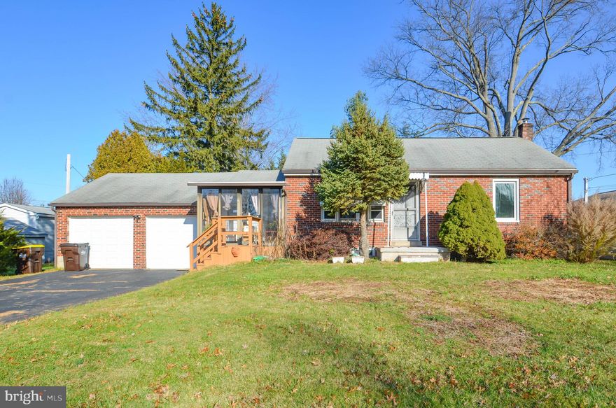 MULTIPLE OFFERS RECEIVED. HIGHEST AND BEST OFFERS DUE THURSDAY, DECEMBER 28 at 10:00am. Tons of potential in this 2 bedroom, 2-bathroom brick ranch, a cozy haven with room to make it your own! The main level has a bright living room, kitchen, dining area, and a sunny sunroom with a second front entrance. Take a few steps down to a family room with a full bath and new sliding doors leading to a backyard that's ready for your personal touch. On the other side of the living room sits two bedrooms with roomy closets, and a second full bathroom. The basement is a canvas for your ideas, providing ample storage and a laundry area. With a little love, the backyard can become your own lush oasis with its existing flower gardens. This home includes a 2-car garage, a paved driveway, and a new porch. This home is strategically positioned, with schools, shopping centers, the ever-convenient Wawa, and major transportation arteries such as Route 309 and the PA Turnpike all within a very short distance. Property is in need of some updates and personal touches but has great potential!