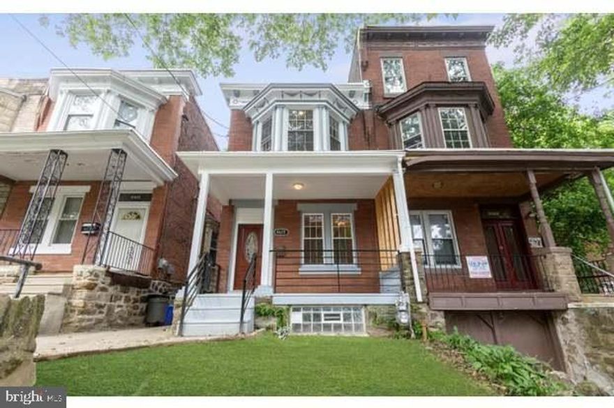 Welcome to 4629 Greene Street! This stunning home in Germantown is a true masterpiece. Beautifully designed, it offers all the qualities desired in a modern residence. The property features a grassy front yard with a welcoming porch. Inside, the main floor showcases a spacious open-concept layout, featuring an inviting living and dining area with recessed lighting and gorgeous rich ash-colored hardwood floors. An impressive industrial staircase leads to the upper level. The living and dining area seamlessly transitions into a stunning gourmet kitchen, which is equipped with sleek, modern custom cabinetry, granite countertops, a tiled backsplash, a central island with seating, and top-of-the-line stainless steel appliances. A convenient powder room is also located on the main floor.  A door in the kitchen opens to a patio in the backyard, which features brand-new synthetic grass and tall privacy fencing. On the second floor, you’ll find four spacious bedrooms, each with closets, along with a full hallway bathroom. The finished basement boasts ceramic tile flooring and includes a full bathroom as well as a laundry room. The property is equipped with central air conditioning and heating. This must-see home is situated on a beautiful tree-lined block, just a 5-minute walk from the park, public transit, supermarkets, and more.