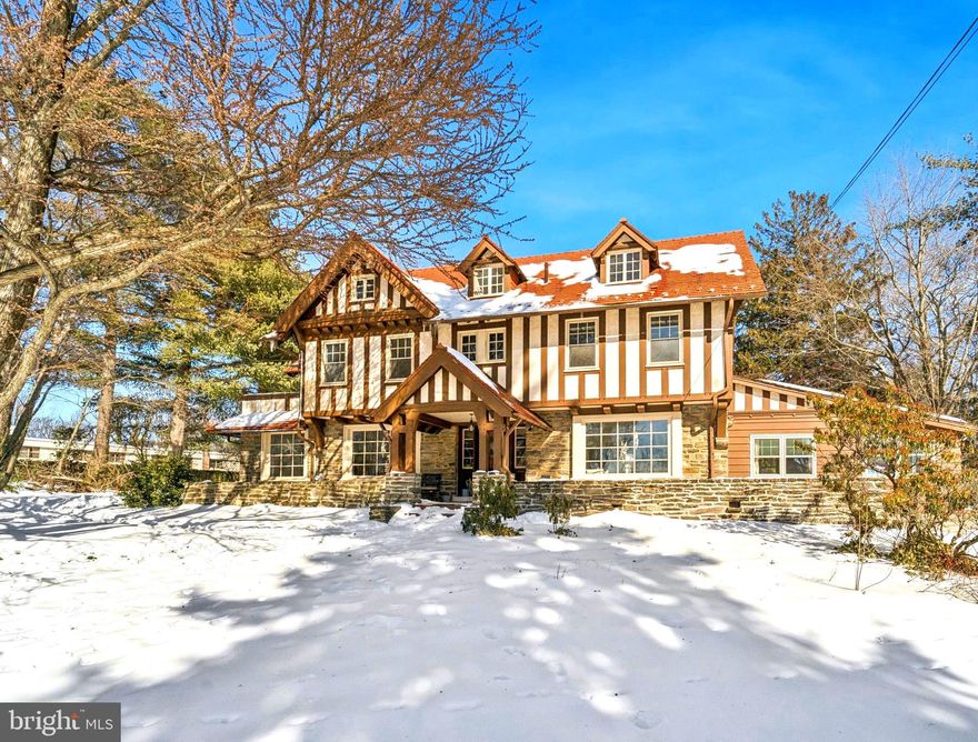 Come see this 6-bed historic tudor with modern upgrades located 25 Minutes to Center City!

Welcome to 1221 Church Road, a masterfully preserved historic tudor that offers something virtually no other home in Wyncote can: the only unobstructed, protected view of the 45-acre Curtis Arboretum.
For over 100 years, this architectural masterpiece has been cherished by just three owners—a testament to its enduring quality and the lifestyle it provides. Now, it stands ready for its next owner. This is not just a home; it is a private retreat where the grandeur of the past meets the effortless luxury of the present.

Step through the distinctive artisan door into a home defined by exquisite millwork, custom wainscoting, and solid core doors. The main level is designed for both grand entertaining and quiet reflection. Host holidays in the dining room with its roaring fireplace and Arboretum views, or retire to the expansive living room, where built-in bookshelves and intricate crown molding frame a space of timeless elegance.

While the style of the home is historic, the systems are decidedly modern. A redesigned chef’s kitchen features high-end appliances and a Butler’s pantry with a wet bar, while state-of-the-art mechanicals ensure year-round efficiency. Upstairs, the oversized primary suite is a true sanctuary, boasting its own fireplace, a sitting room, and a private porch perfect for morning coffee overlooking the grounds.

With 6 bedrooms, 4.5 baths, and a 3rd-floor suite ideal for home offices or guests, there is room for everyone. Located just minutes from the Jenkintown and Glenside regional rail stations, you can enjoy the seclusion of a country estate with a seamless 25-minute commute to Center City.  Enjoy a short drive to Chestnut Hill, Glenside and Jenkintown for dining, shopping, entertainment and award-winning public and private schools to choose from.

Experience the grandeur of the past without sacrificing the comforts of the future. Schedule your private tour of this Wyncote landmark today.