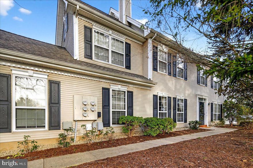 Light-filled 3-bedroom, 2.5-bath end-unit townhome in the desirable Brandon Farms community. The eat-in kitchen opens to the family room with a wood-burning fireplace and sliding doors leading to a rear patio—perfect for indoor-outdoor living. A two-story living room with a wall of windows and an adjacent dining room provide an ideal setting for entertaining. A powder room and laundry room complete the main level.
Upstairs, the spacious primary suite features a private balcony, two walk-in closets, and a full bath. Two additional bedrooms and a hall bath complete the second level.
Additional highlights include a second patio off the kitchen, a two-car garage, and access to award-winning Hopewell Township Schools, including Stony Brook Elementary. Conveniently located near Routes 1, 295, and 95 for easy commuting, and close to shopping, the Lawrence Hopewell Trail, Rosedale Park, and Washington Crossing State Park.