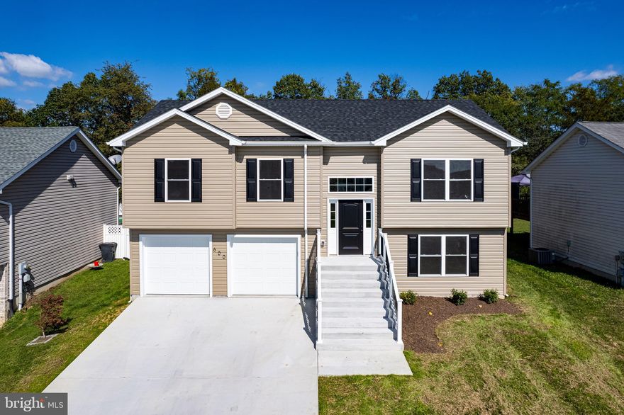 South Berkeley County - Inwood, WV. Brand new and 100% complete. 3 bedroom, 3 bath split foyer with a finished basement and 2 car garage.  Boasting Luxury vinyl plank throughout, granite countertops, large kitchen island and stainless steel appliances.  This house is stunnning - check out the pics! Concrete driveway - 2 cars wide, rear deck and a beautiful lot with a level backyard.  Located in Berkeley County so a lower price point but the location is great for commuting to Virginia and Maryland. Call for more details.