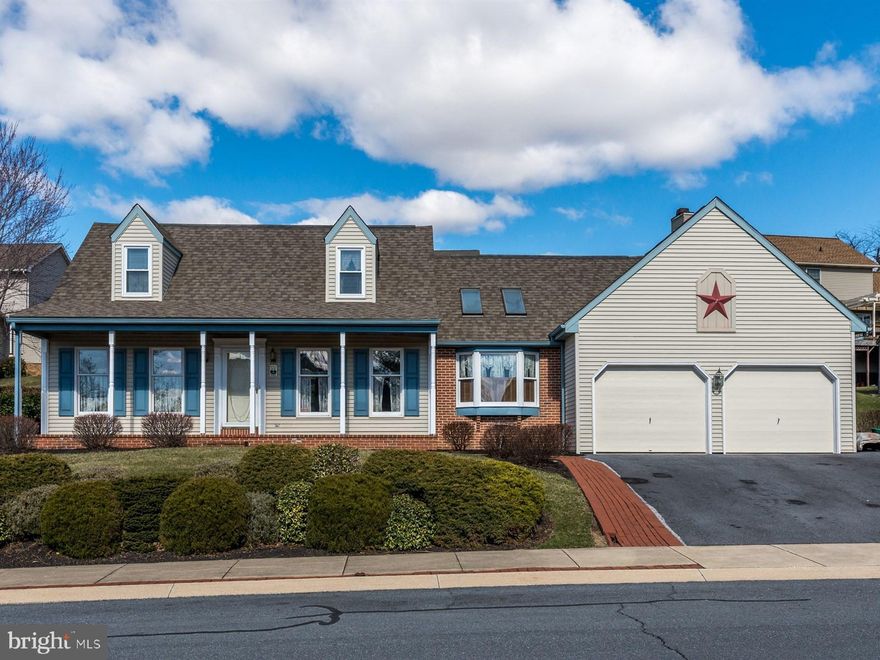 Single family Cape Cod features a large living room with gas fireplace, roomy kitchen and dining area with vaulted ceilings and skylights.  Main level bedroom and fill bath, two additional bedrooms and full bath on the second floor and a partially finished lower level.