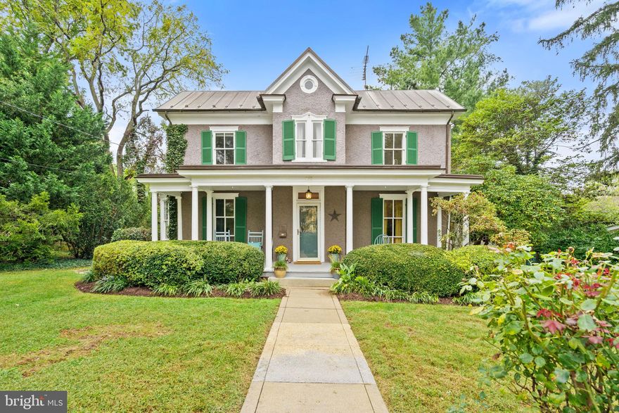 168 High Street stands within Warrenton’s Historic District on approximately 1.15 acres (two parcels)—a rare in-town estate steps from Old Town’s shops and dining. Long regarded as one of the district’s signature addresses, High Street offers architectural pedigree, walkable convenience, and the quiet respite of tree-lined blocks—an exceptional setting for everyday living.

Framed by a vintage cast-iron fence and crowned by a recently replaced solid copper roof (2021), the residence marries historic presence with thoughtfully elevated comforts. Beyond the freshly repainted full-length front porch, the formal, fully fenced grounds unfold with mature oak, walnut, magnolia, redbud, and dogwood, clipped hedges, and four-season perennials. A flagstone walk leads to the rear gardens where a secluded in-ground pool and broad covered back porch create a natural stage for celebrations—birthday parties, summertime gatherings, and easy weekend lounging. A small koi pond, brick one-car garage, double driveways, and available street parking add everyday practicality.

Inside, original hardwood flooring and a central foyer introduce gracious rooms scaled for both entertaining and relaxing: a large office with fireplace/insert and a bay-windowed front sitting/TV room open toward a formal dining room. The fully renovated, permitted gourmet kitchen centers the home’s day-to-day ease with an oversized island, abundant prep/storage, high-end appointments, and an AGA Legacy 44" dual-fuel range. For service and catering, the home retains its original (second) kitchen and a classic butler’s pantry. Dual entries connect the kitchen to both sides of the house and the rear porch, streamlining indoor-outdoor hosting.

Upstairs, the main house offers four bedrooms. Three generous secondary bedrooms share two well-appointed baths. The renovated owner’s suite features extensive Wellborn cabinetry and a modern bath with walk-in shower, ample built-ins, and radiant heated floors—a refined comfort in every season. A cabinet-equipped laundry area sits on this level, and a rear hall balcony overlooks the pool and gardens.

The lower level supplies expansive storage with a rear walk-out beneath the full-length back porch. Tucked discretely at the back of the property, a guest cottage provides one bedroom and one full bath, is heated and cooled, includes a full kitchen, and features independent laundry—an adaptable space for extended stays, guests, or a quiet retreat (confirm any desired use with local regulations).

With its historic significance, elevated everyday comforts, resort-style outdoor spaces, and a premier High Street location near Old Town, 168 High Street offers a move-in-ready in-town lifestyle that is as effortless for daily living as it is memorable for hosting.