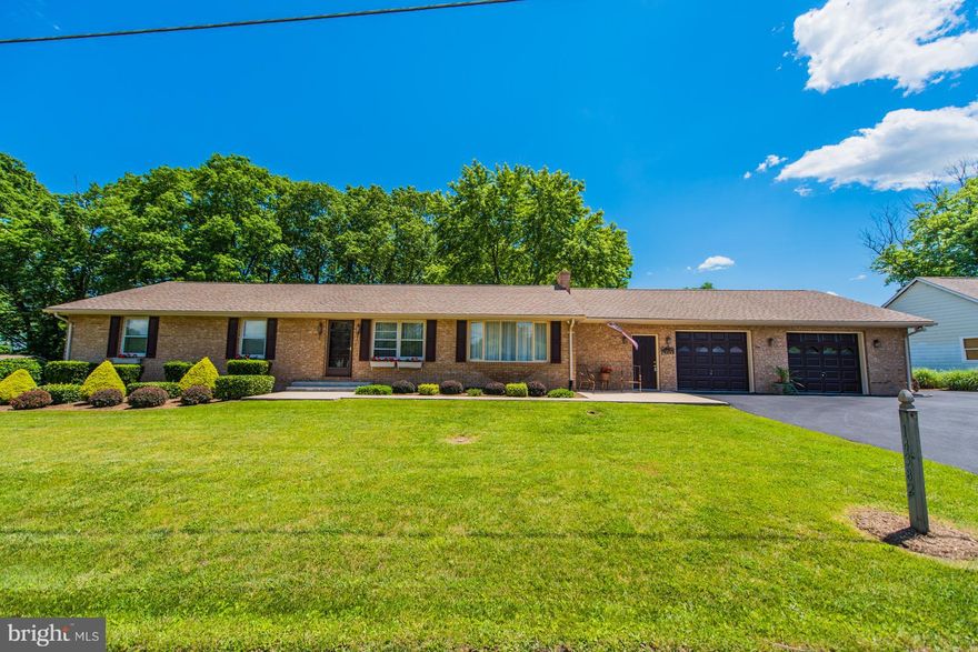 This immaculate very nice brick and vinyl custom built home is spacious, updated stainless appliances with granite counters. huge attached garage with attic storage, work area and kitchenette. Well landscaped grounds with lots of storage areas partly fenced with paved driveway and parking. Enjoy the backyard from the finished screened porch off the kitchen. Lovely move in ready home.