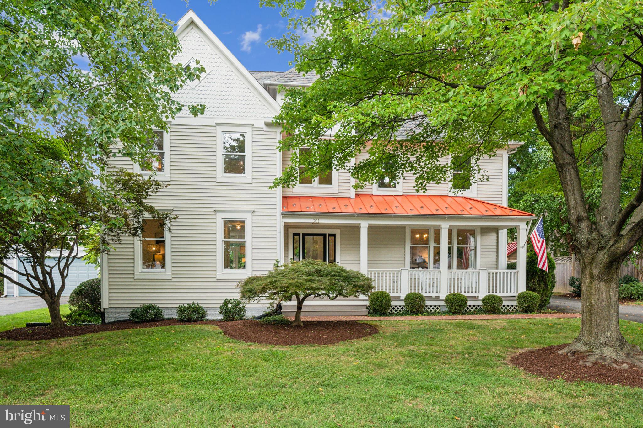 Welcome to 301 Anderson Ave! A modern colonial home perfectly situated in the heart of Downtown Rockville. This beautifully built home was built in 1995 and was architectured to naturally blend with its historic neighbors, and the charm of homes in the West End. This almost 5,000 square foot home hosts five bedrooms, four full bathrooms and a powder room over three finished levels. This home has that extra inviting curb appeal with the front porch you’ve always wanted and its detailed exterior design including a two car detached garage. A short walk to the Rockville Town Square and the metro, this home offers access to so much - it’s truly a rare find.
The main entrance showcases a grand two story entryway, triple crown molding, gleaming hardwood floors, and all new light fixtures throughout the home. The open floor plan is perfect for entertaining and is complete with a wood fireplace and large windows offer bright and sunny views from the rear of the home. The dining area highlights chair rail molding, a modern chandelier, and conveniently flows to the kitchen and pantry which you will find ample cabinet space. The recently refreshed kitchen has everything you could possibly need for daily living and entertaining - an island for 4 barstools with new quartz countertops, all stainless steel appliances and new cabinet hardware. There is a perfect space for a large kitchen table, capturing the backyard views through the sliding-glass doors that conveniently connect to the back patio. Working from home is incredibly convenient with the office space that features plantation shutters and a new light fixture - ready for your new home office space! A powder room can be found on this level, along with a laundry room and a separate entrance leading right out to the two car detached garage.
The upper level features all new carpeting, and you will find four bedrooms and three full bathrooms. The spacious primary bedroom highlights a vaulted ceiling in the bedroom. The spacious en-suite bathroom has everything you could need from dual vanities with quartz countertops, a walk-in shower, jacuzzi tub, and new light and accessory finishes. There is not one, but TWO walk in closets, sure to please your inner fashionista. The remaining three bedrooms are all generously sized, with plenty of closet space, and one featuring an ensuite bathroom.
The lower level of this house features brand new carpet, a recreation area, full bedroom and bathroom, and endless storage space. The open recreation area is open and large and is a great alternative to the family room on the main level. The additional bedroom is next to a full bathroom and a large storage area can be found in the back of this level, allowing you to tuck away any larger items or use as additional recreation space.
Enjoy neighborhood walkability and the convenience of being minutes away from everything in Downtown Rockville including the Rockville metro and endless restaurants and shops! To highlight some of our favorites - Kusshi Sushi, Guiseppi’s Pizza Plus, Regal Cinemas, World of Beer, Starbucks, Potbelly Sandwiches, VisArts Center, Gold’s Gym, Cottage Monet, Marble Slab Creamery and so much more! Not to mention this Anderson Avenue’s location is an easy commute to the Metro, close to two I-270 exits and minutes away from I-495. Make this home your forever home today!
**Offer deadline Tuesday August 13th at 10am.
