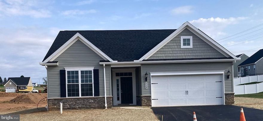 One story living at it's finest just minutes from I-83 in Stewartstown.  Kitchen features 36"  cabinets with crown molding, pantry, garbage disposal, and large granite island which is all open to the dining room and great room. Off the great room is the large master bedroom with double closets leading into the tiled master bathroom with a double sink comfort height vanity , tiled shower with frameless shower door, brushed nickel accessories - all included as standards!!Bedrooms 2 and 3 are located on the opposite side of the home creating the perfect separation and privacy.
Washer and Dryer is located in it's own separate room off of the finished painted 2 car garage!! Come see this today. This is such a great floor plan.