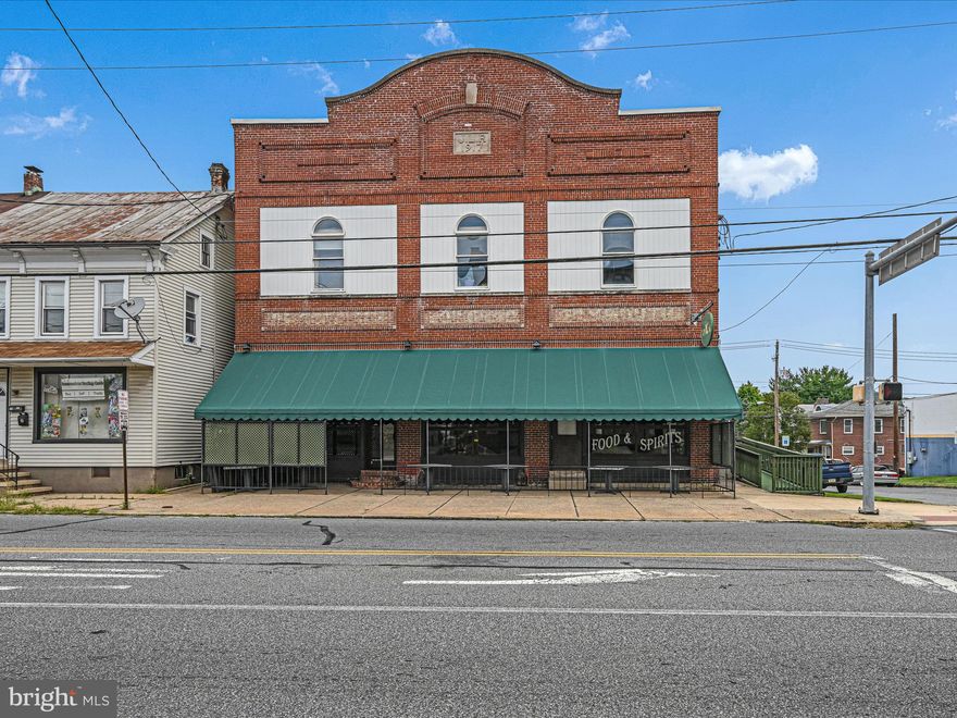 Owner is looking to retire,....Thriving and completely turnkey business opportunity occupying two parcels with  ample off street parking. This sale includes an exceedingly well maintained, thriving, and ongoing restaurant business with liquor license and all business contents. The building and property consist  of an ongoing  main level restaurant,  two rental apartments on the second floor, a large garage rental space on the lower level, and an ample well maintained parking lot that abuts the property on a separate parcel.