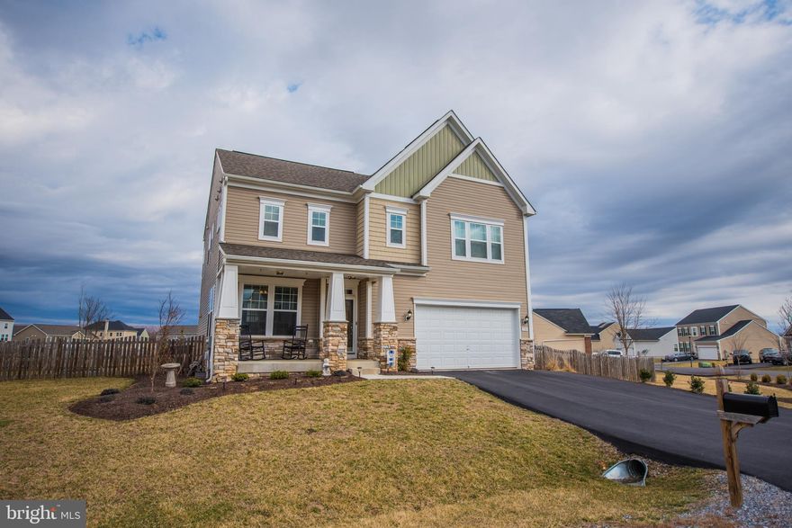 Why build when you can own this almost new home that shows like a model?  Come view this meticulously maintained 4 bedroom, 3.5 bath home on a corner lot that sellers moved into in December of 2015.  This home features hardwood floors, new carpet, upgraded kitchen with granite countertops, marble backsplash and stainless appliances, breakfast room, family room off kitchen with fireplace, master bedroom with tray ceilings, master bath with dual sinks, soaking tub and separate shower, finished basement, widened driveway, landscaping, stone front porch, deck with pergola, plenty of storage and more!  Move-in ready!