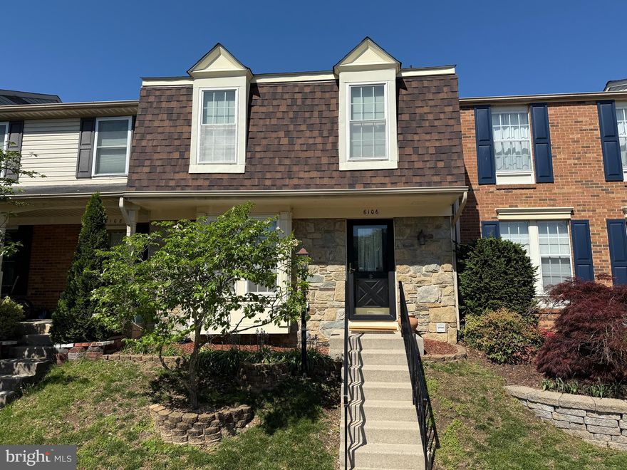 Welcome to 6106 Hyacinth Drive, an appealing stone-front Stanton model in Alexandria’s popular Van Dorn Village. Classic hardwood floors greet you and flow through the living room which has a box-bay window. The powder room has a pedestal sink. There are granite counters in the eat-in country kitchen, along with a tile backsplash, deep sink with a pull-out sprayer faucet, Kitchen Aid stainless dishwasher and stainless microwave and a useful pass-through to the dining room. Step out from the kitchen to the Trex deck with its built-in seat and enjoy the summer! Upstairs, there are two large bedrooms. The owner’s suite has a soaring vaulted ceiling and a walk-in closet with custom organizers. The owner’s bath has been tastefully remodeled with lots of nice tilework including floor-to-ceiling tile in the shower with 2 nooks for products. It also has glass sliding doors. The second spacious bedroom also has vaulted ceilings. The lower level features the rec room with a cozy wood stove with a mantel above. There’s also a half bath, a roomy laundry/storage room and walk-up steps to the rear yard which has a shed for extra items. The roof, HVAC unit and water heater were all replaced in 2025. This lovely three-level townhome is just minutes from the Van Dorn Metro, all major commuter routes, restaurants, Kingstowne shopping and more!