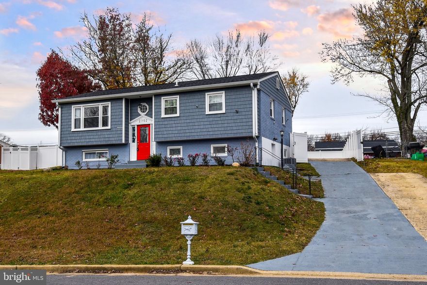 Recently renovated (2018) (super-clean) Open Floor plan located in the highly sought-after Ridgevale subdivision of  Fort Washington (Convenient to National Harbor). The Main Level Consists of the Living Room which enjoys unlimited natural light and panoramic views (The home is elevated ) from large picture windows is graced with warm hardwood flooring. The Living Room flows into the Dining area which overlooks the Chefs Kitchen including stainless steel appliances, granite countertops, tons of cabinet space & direct access to the huge fenced backyard. There are 3 bedrooms on this level. The primary bedroom is the largest and has it's own bathroom. There is a Full Bathroom in the hallway. The Lower Level is freshly painted with brand new flooring. It consists of a huge open space living area which could be used for gatherings or simply a chill spot. There's another bedroom, full bath with walk-in shower (including in-shower seating bench) and room (could be used as den/office/br). This level has a separate and private entrance right at the driveway making it a serious consideration for a separate rental space or Air BnB. The private driveway extends into the fenced backyard providing secure parking. Minutes from National Harbor!
