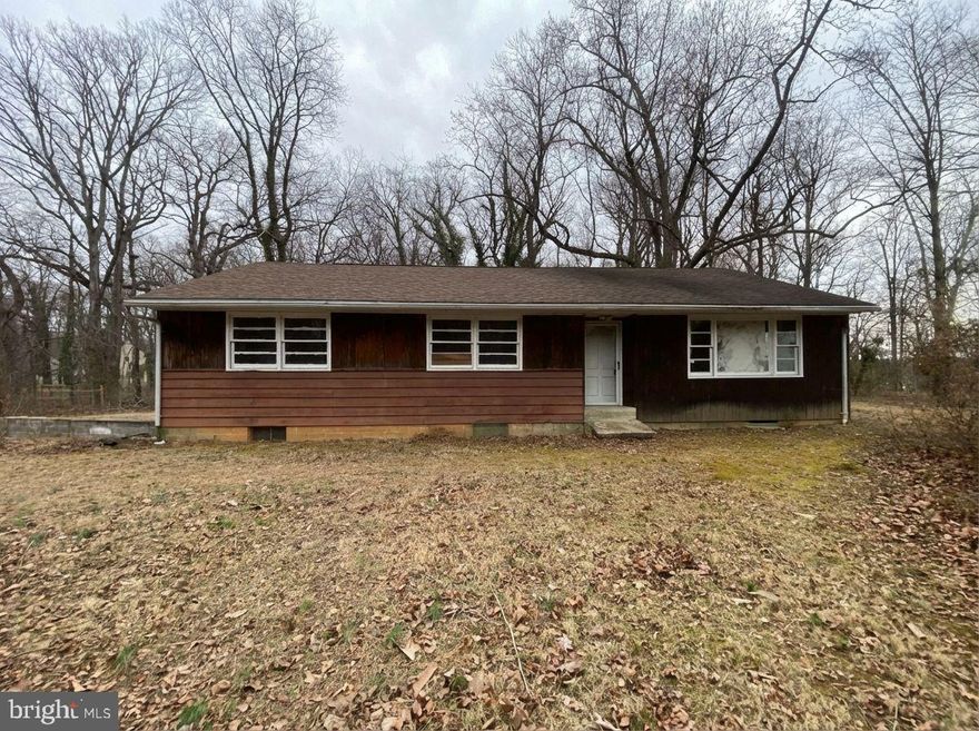 Charming Two-Level Rambler Situated on a Beautiful 1.01-Acre Lot with a Walk-Out Basement and One-Car Garage. This Home Features a Spacious Kitchen, Generously Sized Bedrooms and Hardwood Floors. Excellent Layout with Natural Light and Flexible Living Space. Ideal Opportunity for Buyers Looking to add their own Cosmetic Touches and Updates. Enjoy the Privacy of Acreage while still having Convenient Access to Everyday Amenities. Endless Potential in a Prime Setting.  Hurry This Will Not Last!  Sold As-Is.