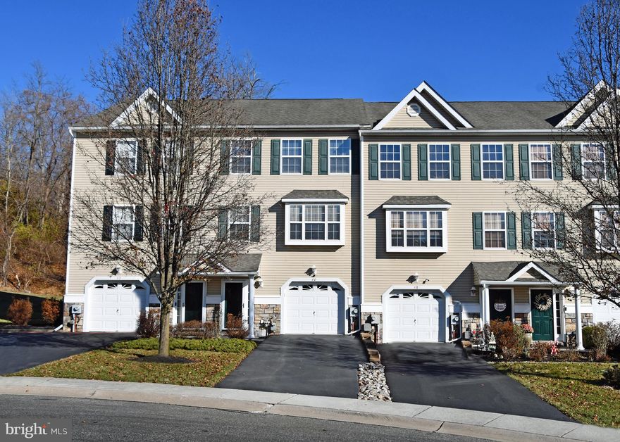 Welcome to 60 Hoag Lane! This large spacious townhome at the end of a private cul-de-sac offers everything that you have been looking for. Situated in the desirable Trotter's Run, it is one of the few homes in the community that boasts a one car garage and private driveway! The lower level welcomes you with a spacious walkout finished basement ideal for entertaining, movie nights, or cheering on your favorite team in the big game - perfect for a man cave or extra family room. This level also includes a laundry area and additional storage space. On the main level, the open floor plan features 10’ ceilings, a cozy gas fireplace, beautiful cherry hardwood floors, a powder room, and an elegant dining area that is large enough for hosting dinner parties. All of this flows into the beautiful eat-in kitchen that features 42” oak cabinets, granite counter tops, and a spacious pantry. Sliding glass doors from the kitchen lead to a large rear deck, providing a great space for relaxation with sunset views, and no rear neighbors for privacy. Upstairs, you'll find three spacious bedrooms with ample closet space, as well as two full baths. The primary bedroom features a walk-in closet, an ensuite bath with a stand-up shower and bench seating. This house home truly has it all! Conveniently located near parks, schools, the Philadelphia airport, SEPTA train stations, Center City, Wilmington, and major highways. Enjoy a great neighborhood, excellent schools, and a home that checks every box.