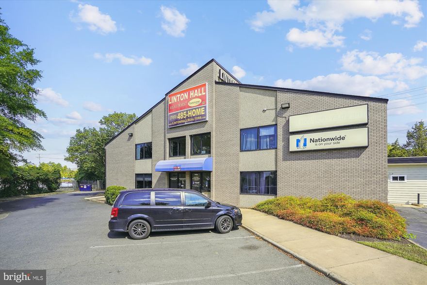 VACANT AND READY FOR IMMEDIATE OCCUPANY!  FIT A LOT INTO THIS SPACE.  960 SF fully furnished office suite for lease in Gainesville at I66/US29 and RT55 with exterior building signage READY FOR IMMEDIATE OCCUPANCY; including utilities. THIS LOCATION PROVIDES RARE “ONE to TWO” MINUTE ACCESS TO I-66; depending on whether you catch the green light.  This second level Suite includes a PRIVATE BATHROOM and a flexible design that could be used for four individual offices, OR some of the offices are large enough for two occupants; i.e. two desks EACH OFFICE. Several offices have windows. The Third Office is larger and could accommodate two to three desks, or be used as conference or common work area.  The Fourth office could be used as one occupant / one desk PLUS reception area. Landlord will consider removing existing office furniture. However, the furniture fits the space very well. Shops and restaurants at Atlas Walk are across the street. Zoned B-1 commercial. Lease rate INCLUDES utilities and INCLUDES exterior maintenance. Tenant responsible for interior janitorial of the suite. Owner/Agent.