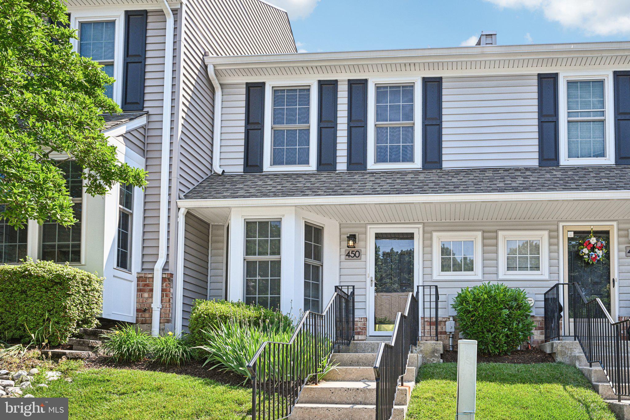 Welcome to 450 Hartford Square—an impeccably maintained townhome tucked away in the highly desirable Exton Station community. Offering 1,563 square feet of thoughtfully designed living space, this 3-bedroom, 2.5-bath home. Step inside through the inviting foyer and into a bright, open-concept main floor where warm-toned flooring and neutral paint create a welcoming atmosphere. To the left, a cozy breakfast nook with triple front-facing windows brings in beautiful natural light and opens seamlessly into the kitchen. The kitchen is equipped with classic white cabinetry, stainless steel appliances, recessed lighting, and plenty of workspace—perfect for home cooks and entertainers alike. At the back of the home, the sun-filled living and dining areas flow together effortlessly. A wood-burning fireplace adds charm and comfort, making this space perfect for both quiet nights and casual gatherings. Glass doors lead out to a private deck that backs to a serene, wooded area—ideal for sipping your morning coffee or unwinding in the evening. Head upstairs to discover a spacious primary suite featuring its own full bathroom. A second generously sized bedroom and another full bath are just down the hall. On the third floor is a large 3rd bedroom that would be perfect for a guest room or home office. The lower level includes a full unfinished basement, providing ample storage and a dedicated laundry area. Conveniently located near major highways, shopping centers, parks, and a wide range of dining options, this home offers the perfect blend of space, comfort, and accessibility. Don’t miss your opportunity, schedule your showing today and see what makes this home truly special!