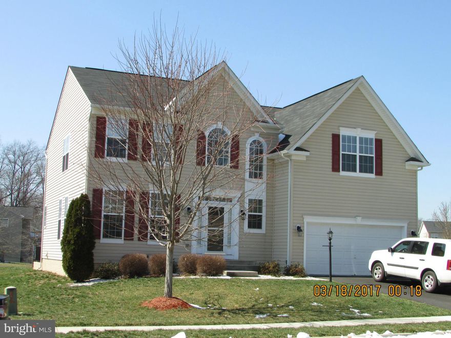 5 bedrooms, 4 and 1/2 bathrooms, bedroom level laundry, main level library, fresh paint, new carpet, granite counter-tops, back splash, wall oven, built-in microwave, crown molding, patio, good size backyard backing to open area, 2 car garage, huge rec room with one full bath.