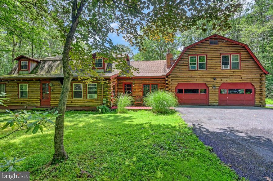 Discover the space, serenity, and natural beauty you’ve been searching for at this unique 8-bedroom, 3-bathroom country retreat nestled on just under 3 private, lush, wooded acres in the heart of Kunkletown with your own stream and hot tub.

 Set back from the road and surrounded by mature trees and open land, this spacious home offers the perfect escape from the bustle of daily life. Whether you’re looking for a full-time residence, a weekend getaway, or a private compound for family and friends, this property delivers the ideal balance of comfort and countryside charm. 

Inside, you’ll find an open and flexible layout designed to accommodate large households or those seeking extra space for hobbies, guests, or a home office. The warm and inviting common areas flow easily into the expansive bedrooms and bathrooms, providing plenty of room for everyone to spread out and unwind. 

The dining room area features a stone fireplace. The living room features a gas stove and is open to an additional dining area/kitchen space. The dining room table seats 12 people. The kitchen has a fridge, and the pantry area has a second fridge. 
The two-car garage has been converted into a game room with a Pool Table ping pong table, and a large seating area with a flat screen TV.

Step outside to your oasis — a covered screened-in porch with a hot tub invites you to relax and take in the peaceful sounds of nature. Just beyond, a covered outdoor patio is perfect for morning coffee, outdoor dining, or evening conversations under the stars. With nearly 3 acres of usable land, there’s ample opportunity to garden, play, or simply enjoy the open space and fresh air. 

There are two outdoor sheds and an open woodshed for storage.  To complete the package there is a newly installed low-nitrogen septic system sized for eight bedrooms.

The house is only 13 miles from Jack Frost Big Boulder (Skiing) and the Lake Harmony Area, and only 13 miles to Blue Mountain Resort. It is about 20 miles to The Crossings Premium Outlet and Camelback Mountain. The community swimming pool is open from Memorial Day through Labor Day. Only 13 miles to Beltzville State Park, which has a huge lake beach and boat launch area. You are minutes from Whitewater rafting, paintball, golf, and more!
The setting is quiet, private, and rich with potential for those who love the outdoors and a slower pace of life. 217 Lower Valley Rd offers an increasingly rare rural lifestyle—spacious, peaceful, and full of possibilities. Come experience it for yourself.