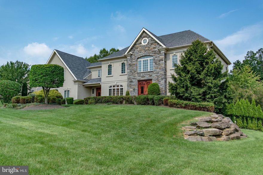 Most Amazing Home in Huntingdon Valley Located in "Inverness". This stone and stucco Colonial, with 6,513 interior square feet (plus lower level), featuring 5 bedrooms, 4 full and 2 half baths. Grand foyer with turned staircase, arched doorways lead to spacious living and dining rooms. French doors lead to the custom mahogany library. Gourmet kitchen featuring granite counter-tops and top of the line professional appliances with walk-in pantry. Great room has a floor to ceiling stone fireplace with picturesque windows. The second level has 5 bedrooms and 3 full baths. The master suite includes a spacious sitting room with custom spa bath with every amenity. The lower level has a 14 foot wood and granite bar opening to a media area great for entertaining, with a full bath and steam shower. The backyard is your own oasis with in-ground pool with spa, stone waterfall and slide. Also is a full sport court and putting green. There is a 4 car attached garage. Award winning, Blue Ribbon Lower Moreland Schools. Don't miss out on this one of a kind home & schedule your private showing today!