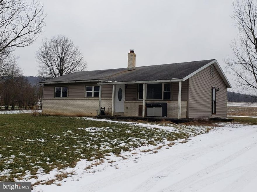 One floor living in the country! 1232 sf 2 bedroom 2 bath home on level .75 acre  with beautiful country views! Most flooring has been updated with laminate or tile, Spacious country kitchen with stainless steel appliances, dining room, and large living room.  Large master bedroom with  tiled full master bath with a Jacuzzi tub. Second bedroom boasts a large closet. The main full bath also contains a laundry area to make one floor living a breeze, Check out the photos of the views.Just minutes from 322 and all the convenience of town living.