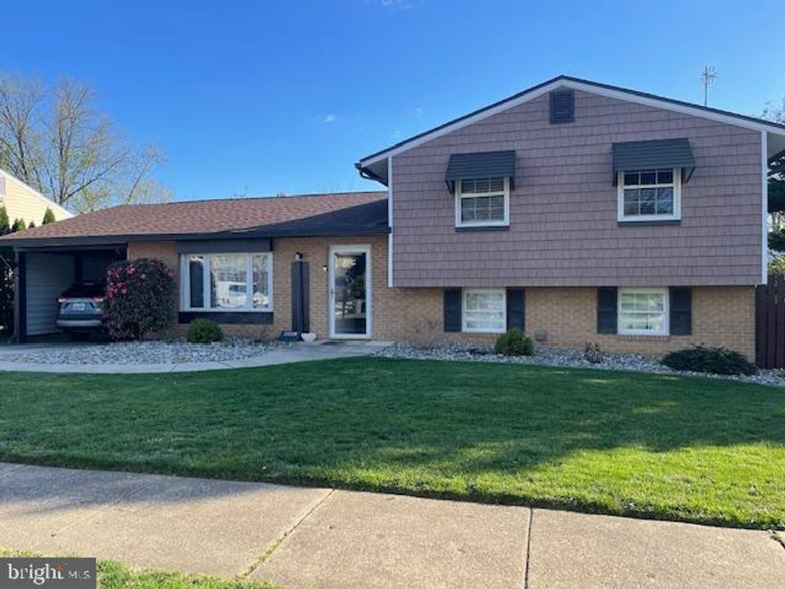 This is the home of your dreams!  Split Level Home with 3 bedrooms & 2 full bathrooms on the upper level.  Main level has a large open living room that leads into the dining room with slider to deck.  Remodeled kitchen with beautiful white cabinets, granite countertops, all stainless steel appliances.   Lower level has a wonderful family room with sliders to outside patio, lush gardens, 2 sheds & fenced in back yard.  There is also workshop, utility & laundry rooms along with powder room.   There is an attached carport to the house with bessler stairs & attic storage.  Parking also in private driveway and on the street.  Close to schools, shopping & several county parks.  Sellers have found home of choice but will need a rent back.  You will fall in Love with this home & the community!  Sellers are offering a 1 year home warranty!