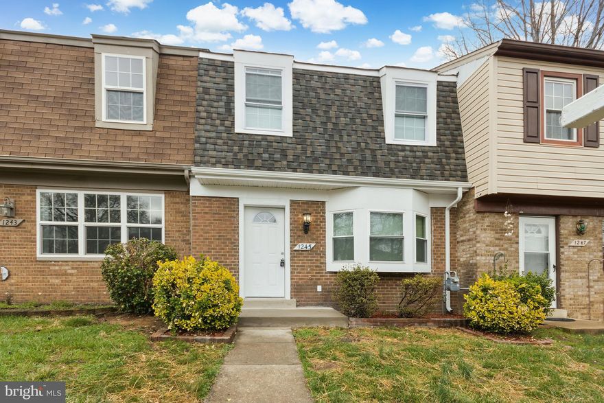 Welcome to this stunning starter home, a beautifully designed interior townhome with three spacious bedrooms and 2.5 well-appointed bathrooms. The home's heart is the new kitchen, featuring modern gray cabinetry, sleek stainless steel appliances, and elegant quartz countertops. A large bay window bathes the space in natural light, creating a warm and inviting atmosphere. Luxurious vinyl flooring combines style and durability throughout the main and upper levels. Recessed lighting highlights each space while providing a contemporary touch. Fresh paint throughout the home adds to its clean and polished look.
The bathrooms are designed with both functionality and aesthetics in mind. They showcase stylish ceramic tile work and newly installed fixtures, including toilets and vanities, that ensure a modern feel. This thoughtfully upgraded home features brand-new doors, lighting, a high-quality roof, and energy-efficient windows that enhance comfort and curb appeal. The HVAC coil ensures optimal climate control, while the convenient pull-down staircase provides access to additional storage. The exterior features durable vinyl siding, making this delightful townhome attractive and low maintenance. A perfect opportunity for homeownership without compromising on style or comfort!