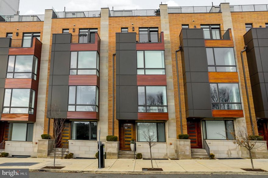 Decadence awaits you at the rarely available Adagio townhomes. Completed in 2017, this 5450 sqft 5bd/5ba/2half home is in the heart of Society Hill, one of the city’s most ideal locations. Features Up to 6,175 SF of total usable space, with a 2-car garage, 6 stop residential elevator, Roof Deck with plunge pool, Outdoor kitchen, outdoor television to watch your favorite teams and a 300 sq' pilot house suite with wet bar, half bath, and elevator access to roof deck. Five floors of bright light, views for days and fully finished living space with every upgrade you can desire, make it easy to call Philadelphia home. Walkable location to city shopping, restaurants, gyms, bars, coffee shops, And more! Commuting is easy with close access to I-95 or Ben Franklin Bridge and a two-car garage with additional ease of street parking. As you enter the main entrance, there is the first floor bedroom suite with a private full bathroom, a large storage closet and garage access to the 2 car garage that features Gladiator storage system and custom epoxy floors. The second floor includes the jaw-dropping living room, complete with an open double height ceiling, beautiful wide plank white oak hardwood flooring and a floor-to-ceiling upgraded stone fireplace accented by a grand chandelier cascading down the center of the living space. Continue into the comfortable  dining space which is set by the back drop of the modern and sleek open steel staircase. There is also a half bath which features custom tile and cool copper details.  The room then opens up to a dream kitchen. Top-of-the-line appliances and ultimate functionality with ample space to entertain and bring out your inner chef. Featuring custom cabinetry, top level quartz counter, substantial center island where the quartz waterfalls to the floor to add a statement, Stainless steel appliances including a Wolf 6 burner gas range and range hood, french-door refrigerator, dishwasher, built-in wall microwave & oven, Built in Miele coffee maker, ample counter and storage space, and more.  As if that’s not enough, there is a  stunning  dry bar with wine storage, wine fridge and an additional mini fridge to complete the kitchen. The first of three decks is located off of the kitchen. Perfect for grilling on summer nights. Continue to the next floor where you will find an incredible primary suite.  A huge walk-in closet with two separate entrances and outfitted to maximize your space. The en-suite bath is just steps away and includes a soaking tub with a view, dual sink vanity and walk-in shower steam. The upper floor laundry is on 4th floor with additional storage. There are two bedrooms on this floor both include a private bath and large closets and one features a balcony with incredible water views. Between the bedrooms is a flex space currently used for home office with custom built in workspace! Top floor features the pilot house, half bath, roof deck access and wet bar. Enjoy the beautiful views overlooking the Delaware River while soaking in the plunge pool. The rear section of the roof deck includes a built-in outdoor kitchen with a grill and mini fridge. The house also features a finished basement features a TV/Media room and mini wet bar with wine fridge. A fifth bedroom currently set up as the home gym with additional storage and hall bath with walk-in shower is another plus.  There is also a whole house water filtration system. Every detail was thought out when designing this home and is ready for the discerning buyer! Live in the center of it all without sacrifice! Make your appointment today