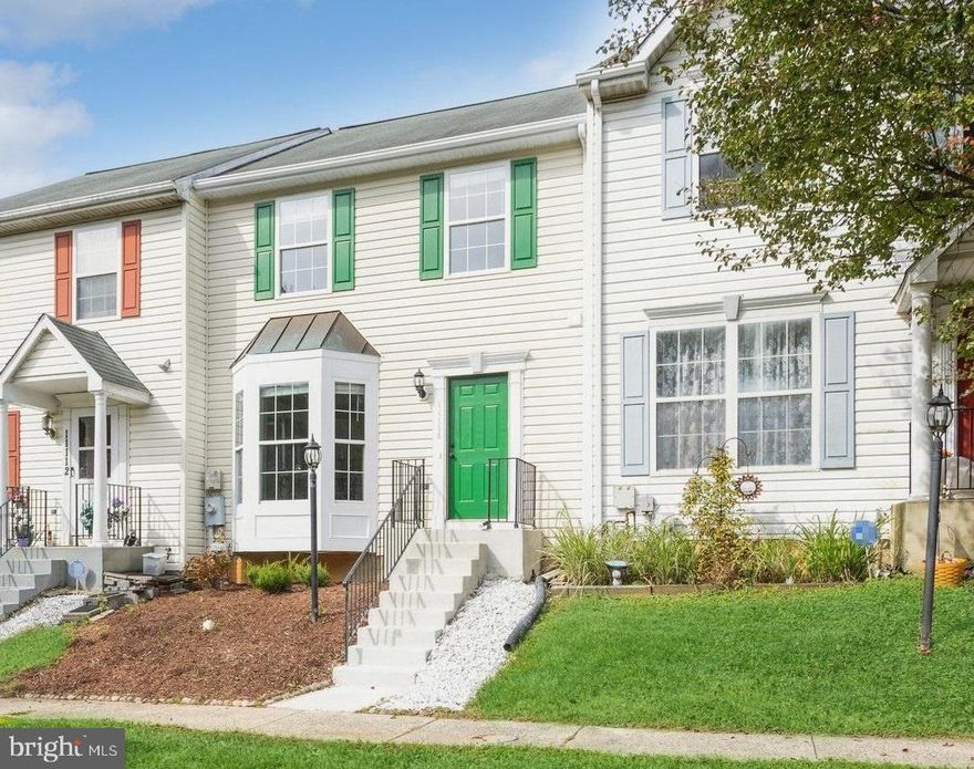 Spacious Updated townhouse in excellent location. Freshly painted and all new flooring.  Large updated kitchen with new quartz countertops, new stainless steel appliances, white cabinets and  bay window bump-out.  Large open  dining room and  living room w/ sliders to custom wood deck* Finished lower level with family room* Walk-out stairs in lower level* 2 spacious master bedrooms on upper level* New remodeled luxury bath with oversized shower. Private back yard that backs to treed area. Excellent location close to transportation, shopping and  other great features.