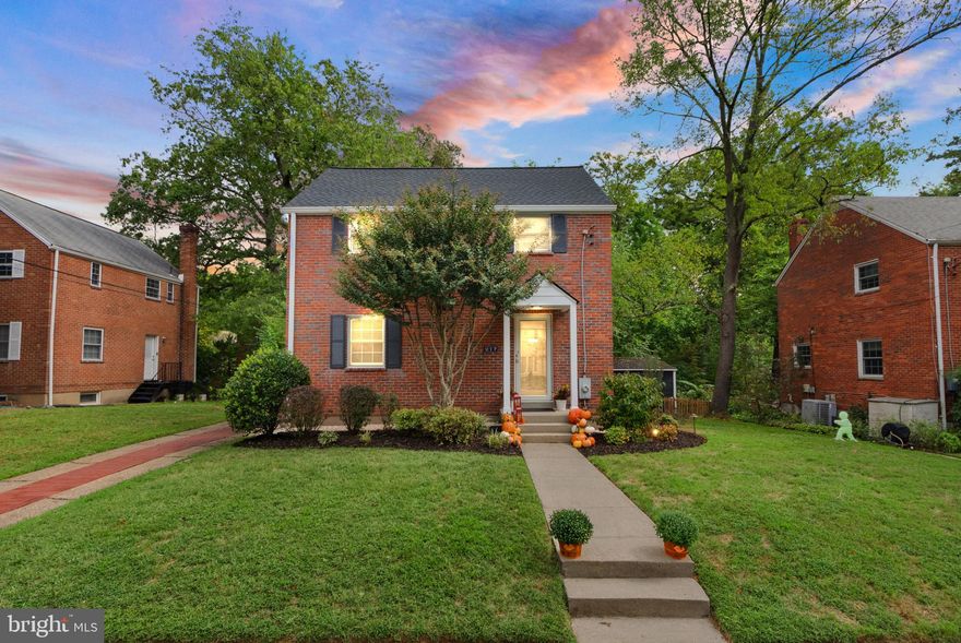 Tucked away on a quiet cul-de-sac in Arlington Forest, this beautifully renovated colonial feels like a private oasis yet keeps you connected to everything you love about Arlington living. With Lubber Run Park as your backyard, you will wake up to the sound of birds, stroll shaded trails just steps from your door, and enjoy the kind of privacy that feels worlds away, all while being less than a mile from Ballston Metro, Ballston Quarter, Harris Teeter, and countless shops and restaurants.

Step inside to find a home that has been fully refreshed from top to bottom. Freshly painted in Benjamin Moore’s “White Dove” and paired with refinished hardwood floors, the light filled interior feels crisp, modern, and timeless. The updated kitchen features white shaker cabinets, granite countertops, stainless steel GE appliances, and adjustable LED lighting throughout, creating the perfect setting for both everyday living and entertaining.

The expansive screened in porch is a showstopper, a true outdoor living room overlooking the fenced backyard and mature trees. It is the perfect spot to sip morning coffee, host dinner with friends, or unwind in the evenings in total privacy.

Upstairs, you will find three spacious bedrooms with original solid wood doors, all full of natural light, along with an updated bathroom. The lower level offers a versatile recreation room, a fully remodeled bath, and a walkout to the backyard, making it ideal for a home office, guest suite, or playroom.

Additional highlights include a brand new roof, Anderson windows, a new front door with a full glass storm door, and a large driveway that accommodates two to three cars plus ample street parking.

The location is second to none. Walk to multiple neighborhood parks, Arlington Forest Club, and the Lubber Run Community Center. Commuters will love the quick access to Route 50, the Pentagon, National Airport, and Washington DC.

This home blends modern upgrades with classic charm and unbeatable convenience. Once you step inside, you will realize it is not just a house, it is the Arlington lifestyle you have been waiting for.