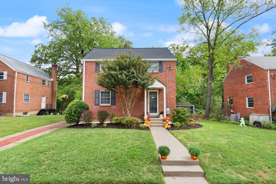 Tucked away on a quiet cul-de-sac in Arlington Forest, this beautifully renovated colonial feels like a private oasis yet keeps you connected to everything you love about Arlington living. With Lubber Run Park as your backyard, you will wake up to the sound of birds, stroll shaded trails just steps from your door, and enjoy the kind of privacy that feels worlds away, all while being less than a mile from Ballston Metro, Ballston Quarter, Harris Teeter, and countless shops and restaurants.

Step inside to find a home that has been fully refreshed from top to bottom. Freshly painted in Benjamin Moore’s “White Dove” and paired with refinished hardwood floors, the light filled interior feels crisp, modern, and timeless. The updated kitchen features white shaker cabinets, granite countertops, stainless steel GE appliances, and adjustable LED lighting throughout, creating the perfect setting for both everyday living and entertaining.

The expansive screened in porch is a showstopper, a true outdoor living room overlooking the fenced backyard and mature trees. It is the perfect spot to sip morning coffee, host dinner with friends, or unwind in the evenings in total privacy.

Upstairs, you will find three spacious bedrooms with original solid wood doors, all full of natural light, along with an updated bathroom. The lower level offers a versatile recreation room, a fully remodeled bath, and a walkout to the backyard, making it ideal for a home office, guest suite, or playroom.

Additional highlights include a brand new roof, Anderson windows, a new front door with a full glass storm door, and a large driveway that accommodates two to three cars plus ample street parking.

The location is second to none. Walk to multiple neighborhood parks, Arlington Forest Club, and the Lubber Run Community Center. Commuters will love the quick access to Route 50, the Pentagon, National Airport, and Washington DC.

This home blends modern upgrades with classic charm and unbeatable convenience. Once you step inside, you will realize it is not just a house, it is the Arlington lifestyle you have been waiting for.
