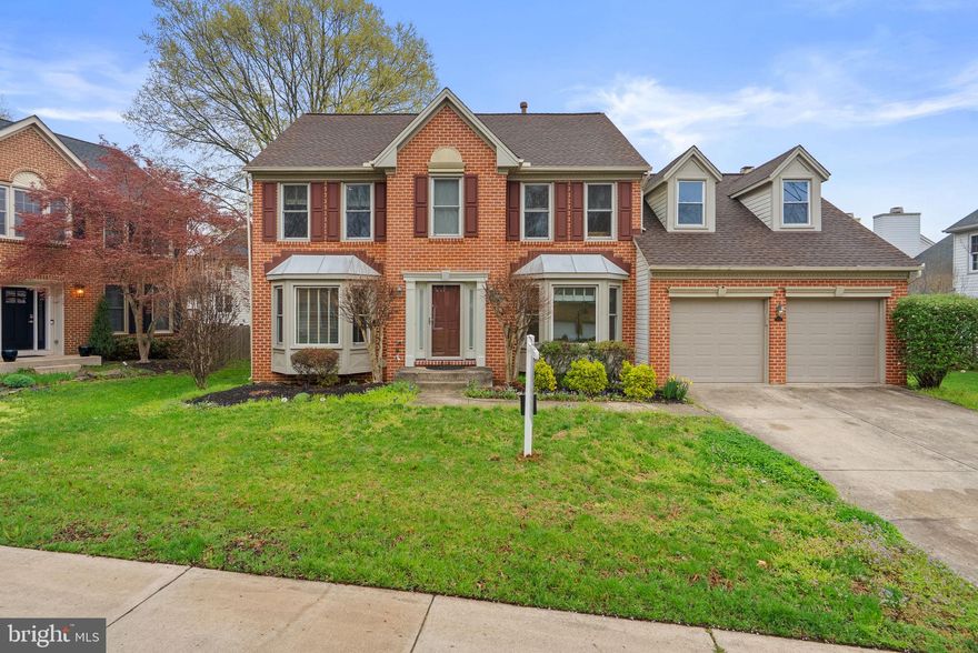 Situated in the sought-after Greens at Crofton community, this classic colonial offers a traditional layout, generous room sizes, and inviting spaces designed for everyday living and entertaining alike. Hardwood floors welcome you in the entryway and continue into the dining room and kitchen. The sun-filled living room features a charming bay window that brings in beautiful natural light, while just beyond glass French doors, the main-level office with built-ins provides a quiet and versatile retreat for working from home, studying, or simply unwinding.

The spacious family room is highlighted by a vaulted ceiling and access to the backyard, creating a comfortable gathering space with an easy indoor-outdoor connection. A conveniently located half bath and laundry room complete the main level.

Upstairs, the private owner’s suite offers hardwood flooring and an adjoining full bath, creating a peaceful place to recharge. Three additional bedrooms and another full bath are located just down the hall, providing plenty of space for family, guests, or flexible living needs.

The recently renovated basement expands the home’s livability with a rec room, bonus room, full bath, built-in desk, chic accent wall, and wet bar, deal for entertaining, hobbies, work, or overnight guests. Outside, the level fenced backyard offers plenty of room to play, gather, or enjoy a game of cornhole, while the back deck is a great place for grilling and outdoor dining. Custom window treatments throughout add a polished finishing touch. Welcome home!