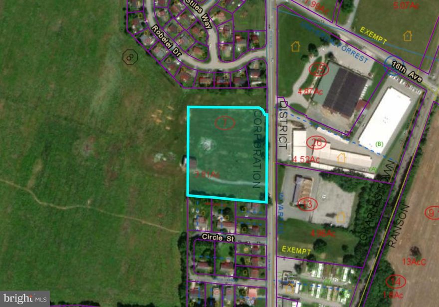 3.81 acres zoned commercial. Fronts a new subdivision. 500 ft road frontage to Rt. 115 on N. Mildred Street. Can be rezoned if need be.