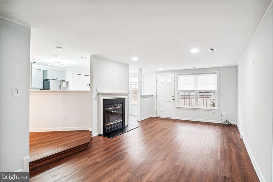 Wonderful two-story townhome available for rent in one of the East Village's most popular communities. Featuring new stainless appliances, cabinets and quartz countertops, wood burning fireplace and recessed lights throughout - this home is ready for a new tenant to move right in. Upstairs you will enjoy a primary suite with balcony and dual closets, as well as a nicely sized secondary bedroom with upgraded full bath in the hallway. Driveway parking is available as well as extra spots on the side of the building.  Montgomery Village neighborhood boasts amenities including basketball and tennis courts, walking paths, pools, playgrounds and convenience to all major commuting routes. Welcome home!