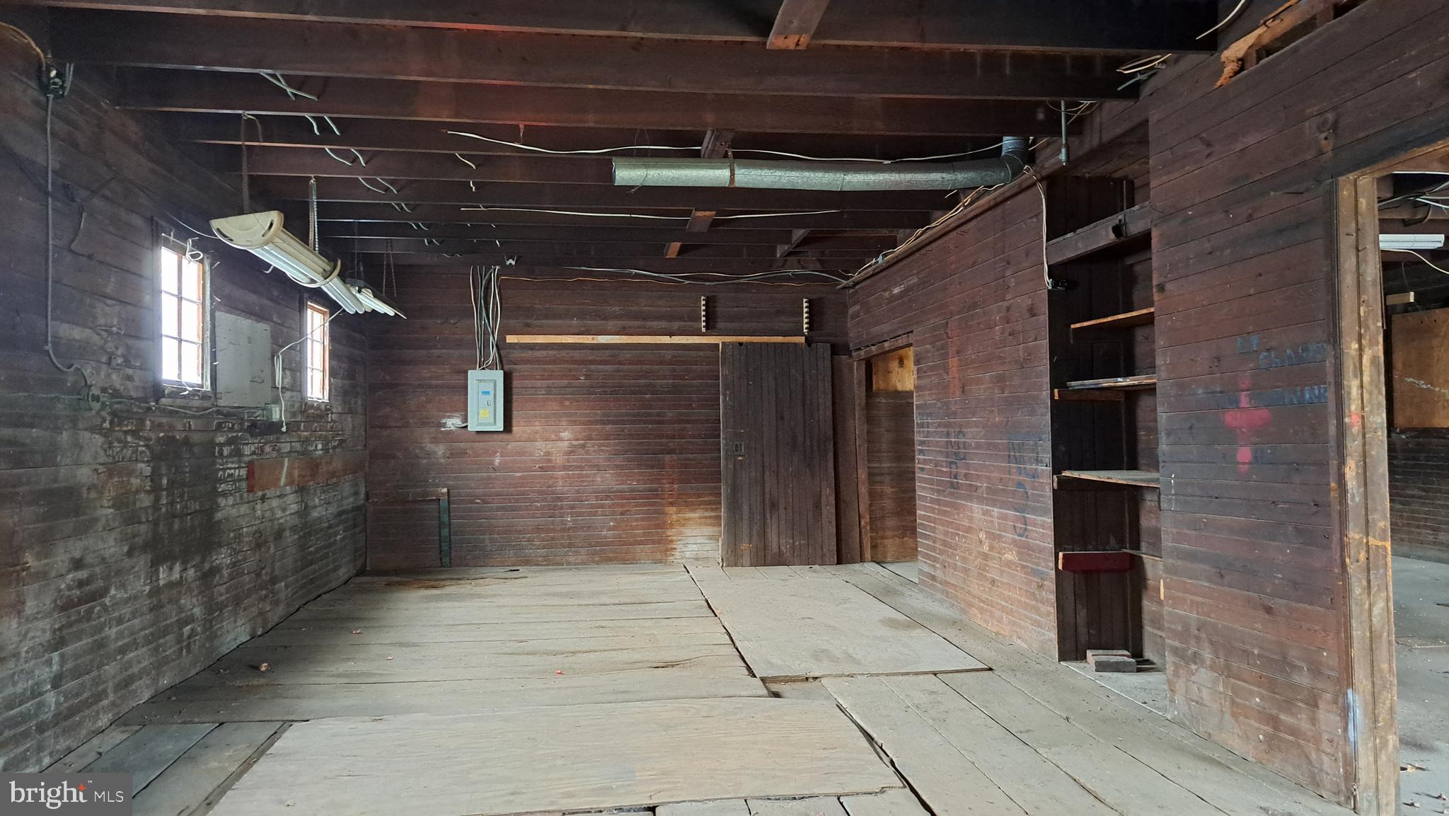 Extraordinary storage opportunity....2 floors... know it looks a little rough but roof is solid and has elecric and believe water is available. Please be courteous of tenants in triplex (in front) and neighbors. Do not block tenant parking or driveway which goes straight thru from mt. carmel to wilson. Great two story oversized garage. Basically for storage. No work to be done there so as not to inconvenience the neighbors and tenants. There is an electric meter there, just needs to be activated. Almost 1100 sq feet of first floor space plus the second floor. Parking parallel to the two bay doors and on the right hand side of the garage.