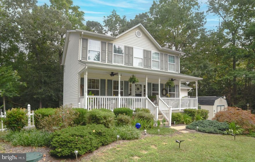 Welcome to this beautiful  2-story colonial home situated on almost 5 private acres, offering the perfect blend of modern updates and timeless charm. As you approach the property, you'll be greeted by a charming covered porch, ideal for enjoying the serene surroundings.

The newly installed luxury vinyl plank flooring, creates a warm and inviting space throughout the main level. The updated kitchen  featuring Corian countertops, white cabinets, and stainless steel appliances make this a light and bright space to preparing meals.

On the second level, you'll find three spacious bedrooms, including the  primary bedroom  with a vaulted ceiling, providing an airy and spacious feel. There's a generous walk-in closet, ensuring ample storage for all your belongings. The connecting bathroom is complete with double sinks, a  soaking tub, and a separate shower, perfect for unwinding after a long day.

The lower level of this home is a versatile space that can suit various needs. It could function as a private in-law suite, offering a bedroom with its own beautiful bathroom. Additionally, the lower level  an entertainment area, complete with a kitchenette equipped with a mini fridge, wine fridge, ice maker, and sink. This setup is perfect for hosting gatherings or providing guests with a comfortable and independent space to relax.

Backyard providing a sense of seclusion with wooded backdrop and is a great entertaining place with it's own Tiki Bar, firepit, & pool.  No HOA so bring the toys