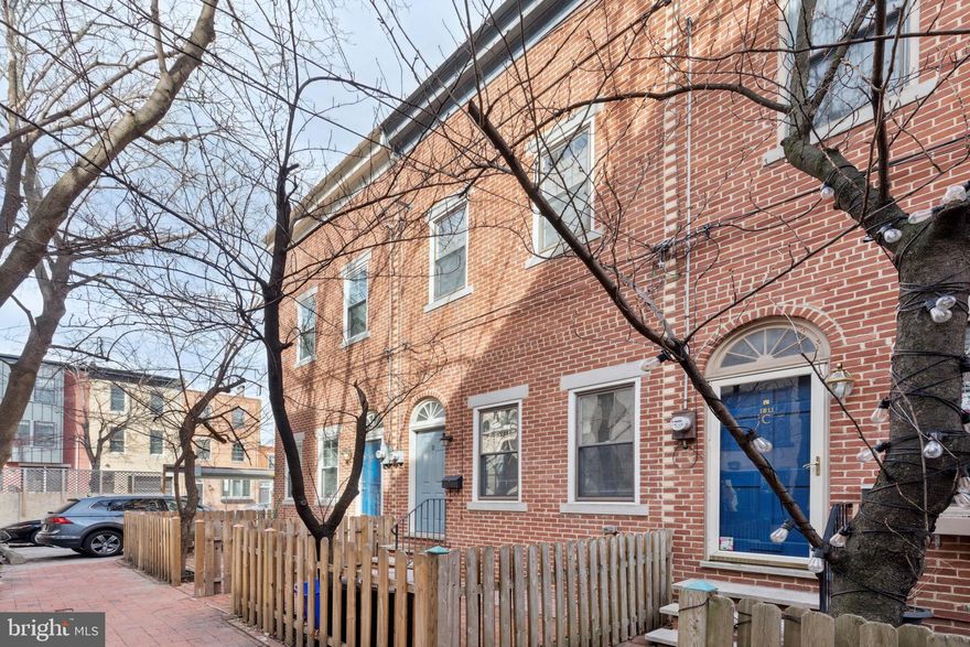 1811 Fitzwater St. #B is a 3-bedroom, 2.5-bathroom home in the heart of Graduate Hospital, located in a private, gated community, offering secure parking, and 2 outdoor spaces. The first floor features a bright and spacious open-concept living area with fireplace that flows seamlessly into the eat-in kitchen, complete with a breakfast bar, stainless steel appliances, and ample counter and cabinet space. A convenient half bath is also located on this level. Upstairs, the second floor boasts three generously sized bedrooms, two full bathrooms, and a washer and dryer for ultimate convenience. Enjoy the fully fenced-in, large rear yard and cozy front garden, perfect for relaxing or entertaining. With a newer roof and siding, this home is move-in ready and offers the perfect blend of comfort, convenience, and city living. Just steps away from Marian Anderson Rec Center, and multiple excellent dining options, this home also offers easy access to the vibrant shopping and dining scene of center city.