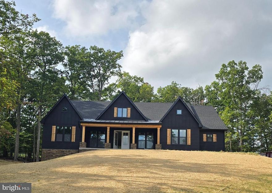 To Be Built 3 +/- acre wooded acres situated in Lake Forest Estates! Well established community that offers the perfect amenities for residents and your guests. Exclusivity for you and the community members sharing the 10 acre lake, pond, pavilion with picnic area with basketball court, fishing dock, , views of the Shenandoah Valley, access to the Appalachian Trail and so much more. Your home will fit perfectly and will include the following: 4 bedrooms with 3.5 baths ranch craftsman style home. Quality construction nicely upgraded with full kitchen appliance package, granite, luxury vinyl plank flooring, upgraded cabinets, vaulted ceilings & more. Full unfinished basement. Close to amenities. Pictures are of similar finishes with various upgrades on this new house design. Construction to begin soon with September 23rd 2024 delivery.