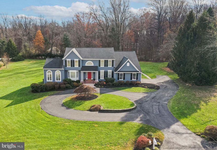 There is a deadline for offers of Monday 12/6 at 4pm. This stunning four bedroom, four full and one half bath, center hall colonial home is beautifully sited in a park like setting at the end of a quiet cul-de-sac. Welcome your guests into the elegant two story foyer with sparkling hardwood flooring. This beautiful foyer is flanked by the grand formal dining room as well as the flowing formal living room that carries you into the spacious and bright sunroom. The main level offers sparkling hardwood flooring throughout, custom moldings as well as open and inviting entertainment spaces. The gourmet kitchen will satisfy the most discerning chef offering a center island, granite countertops, recessed lighting, and tons of cabinet space. There is plenty of extra appliance storage in the additional pantry/laundry/mudroom. The kitchen opens to the two story family room where you can cozy up the floor to ceiling brick wood-burning fireplace and raised hearth. In addition there is a private, sundrenched library with brand new plush carpet, a wall of windows and built-in shelving. Continue your entertaining in the newly carpeted lower level with its large recreation areas – it's the perfect place for watching the big game. There is an additional full bathroom and tons of storage as well! Retire at the end of a long day to the upper level where you will find a huge owner's suite with a walk in closet and cathedral ceiling. Relax and unwind in the owner's bathroom that offers jetted soaking tub, separate shower and water closet. Rounding out the upper level is an additional princess suite with private bath as well as two other bedrooms sharing a Jack and Jill bathroom. Last but not least and not to be overlooked is an amazing custom and spacious architectural designed screened in porch and deck. The sprawling stone patio provides the perfect place to gather and entertain, tell stories, or just relax. Beautiful mature landscaping & hardscape, and 2-car garage are just a few of the additional endless amenities!