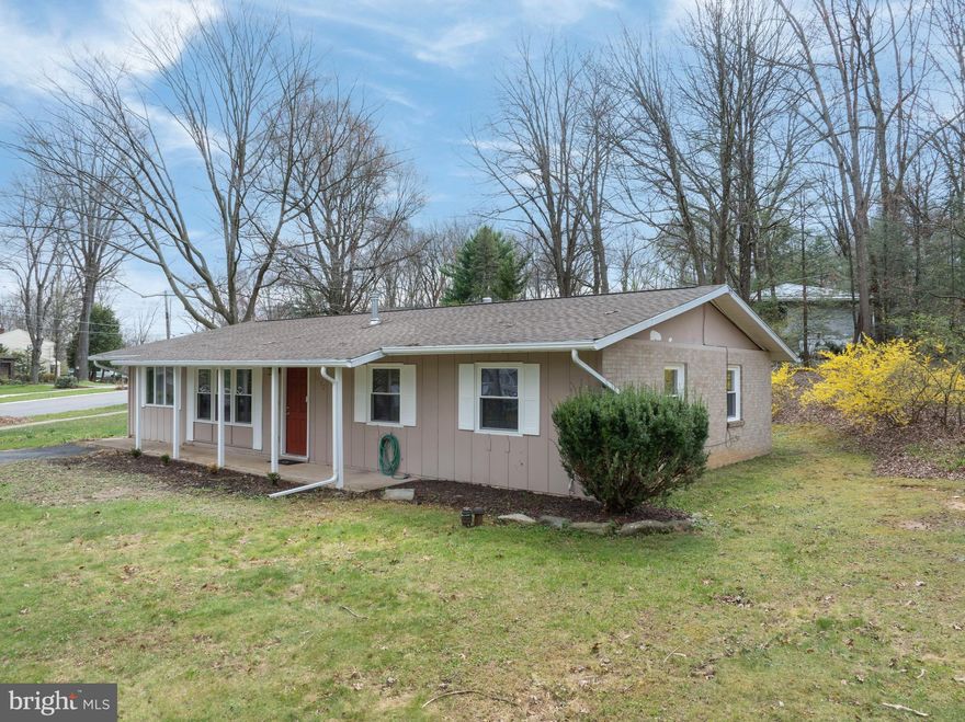 OPEN HOUSE - Thursday, April 9th, 4:00 - 5:30 PM.  Set on a generous corner lot in Park Forest, this 4‑bed, 1.5‑bath ranch offers easy main-floor living in a great neighborhood! Step inside to a spacious living room anchored by a built‑in gas fireplace and a wide triple‑window unit that fills the space with natural light. Just off the living room sits an expansive bedroom with its own private exterior entrance, offering flexibility for guests, a home office, or a quiet retreat. The galley kitchen features white cabinetry, a backyard‑facing window, and a smooth connection to the dining area, where doors open to the patio and tree‑lined yard. A dedicated laundry room sits just beyond the kitchen with direct outdoor access. Down the hall are three additional bedrooms, a full bath, and multiple closets. The primary bedroom enjoys convenient access to a half bath, also connected to the dining/kitchen area. Outside, the corner lot provides extra space, natural privacy, and flexible outdoor living, all within minutes of parks, schools, shopping, and the North Atherton corridor. Newer roof in 2018. Don't miss this charming ranch home on a standout lot in one of State College’s most established neighborhoods. Call for a showing today!