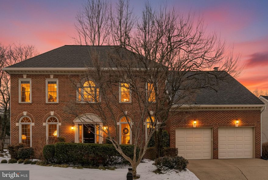 This classic brick front Center Hall Colonial offers beautifully finished living space across three levels, thoughtfully updated with today’s most desired features. Recent improvements include a new kitchen and 4.5 baths, roof, gutters, windows, slate patio, newly stained deck, backyard landscaping, HVAC, switches and outlets, new brushed nickel lever door hardware, new basement carpet, plus fresh paint throughout—truly move-in ready.

The main level showcases gleaming hardwood floors and an ideal floor plan for both everyday living and entertaining. The fully renovated kitchen features stainless steel appliances, custom cabinetry, quartz countertops, a farmhouse sink, stylish backsplash, and a separate eating area. Gracious Living and Dining Rooms provide elegant gathering spaces, while the inviting Family Room with a wood burning fireplace opens to an expansive deck and patio—perfect for indoor-outdoor entertaining. A half bath, private Office, Laundry Room, and convenient access to the two-car garage complete the first floor.

Upstairs, the spacious Primary Suite impresses with a tray vaulted ceiling, two walk-in closets, and a luxurious en-suite bath featuring a soaking tub, dual vanities with Calacatta Borghini marble counters, separate water closet, and walk-in shower with frameless glass doors. Three additional bedrooms include one with a private en-suite bath, plus a well-appointed hall bath.

The finished lower level offers a walkout with stairs, new carpeting and exceptional flexibility with a large recreation room, fifth bedroom or optional workout room, a full bath, and abundant storage space.

A rare combination of timeless architecture, modern upgrades, and generous living space—this exceptional home is ready to welcome its next owners.

Within walking distance to Madison High School and Louise Archer Elementary schools.