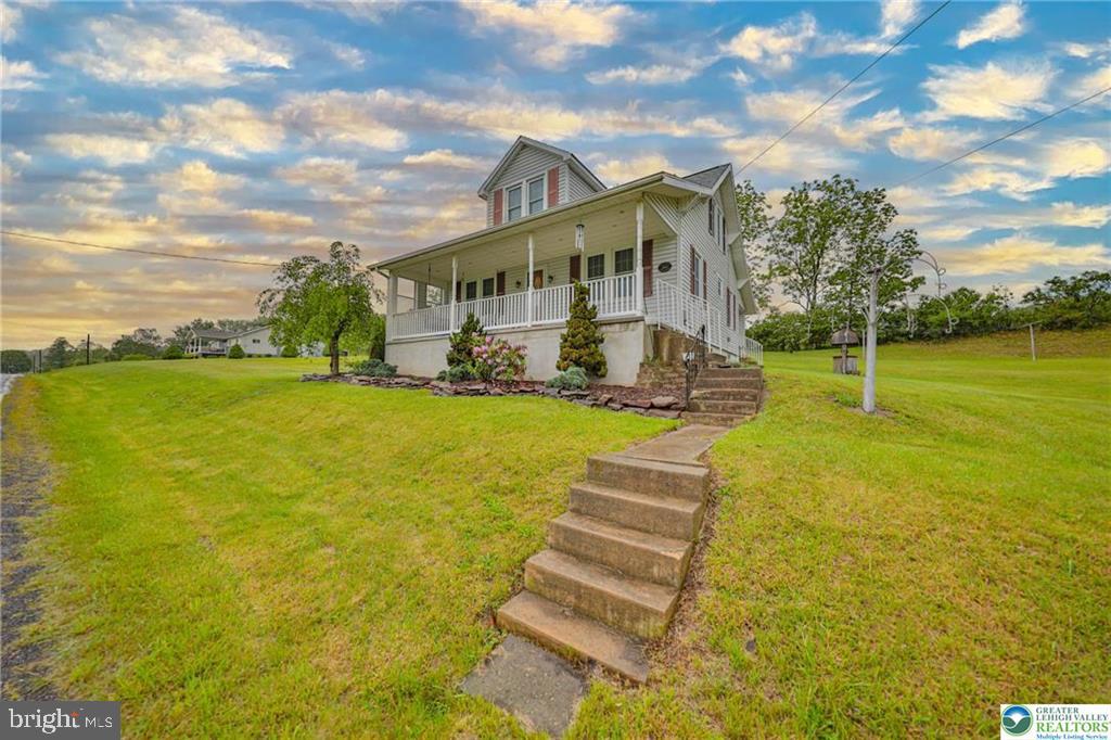GREAT HOME! GREAT LOCATION! If you love a home with spacious rooms, hardwood floors and natural woodwork, then this 3-BR, 2-BA custom built "Sears Craftsman" Old style home nestled in Franklin Township, is just for YOU! You'll love the spacious rooms, hardwood floors and natural woodwork of this that greets you the moment you enter! Remodeled eat-in kitchen includes stylish honey oak wood cabinets, Corian counters with backsplash, double stainless drop-in sink and stainless appliances. A bedroom (being used as an office, remodeled full bathroom, family room and laundry/mud room are all on the main level. The bathroom on the 2nd floor was also remodeled and features a "Safe Step Walk In Tub" with 2 same size bedrooms with additional storage! While the home has been well maintained, (newer roof installed 2022, mini-splits, replacement windows, and other improvements mentioned above. A large yard, landscaped gardens and shade trees add to the homes setting. The home is being offered and sold "AS IS". Conveniently located close to Penn's Peak, Beltzville Park, Lehighton and downtown Jim Thorpe and Pocono Tourist Attraction. Minutes to RT 209 and PA Turnpike makes it perfect for easy commuting! This home has held over 51+ years of great family memories, bring your family and start making yours TODAY!